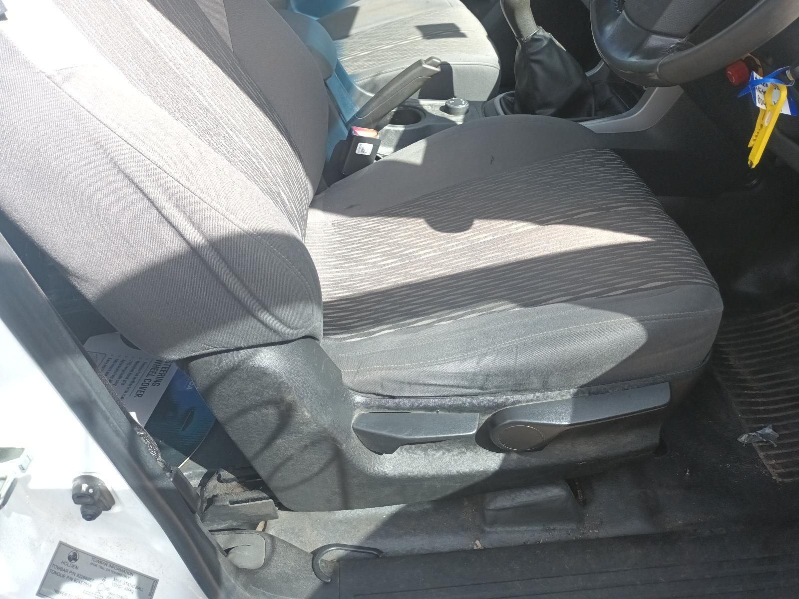 A Close Up of a Car Seat with a Yellow Tag on It — South West 4WD Wreckers In Brisbane, QLD