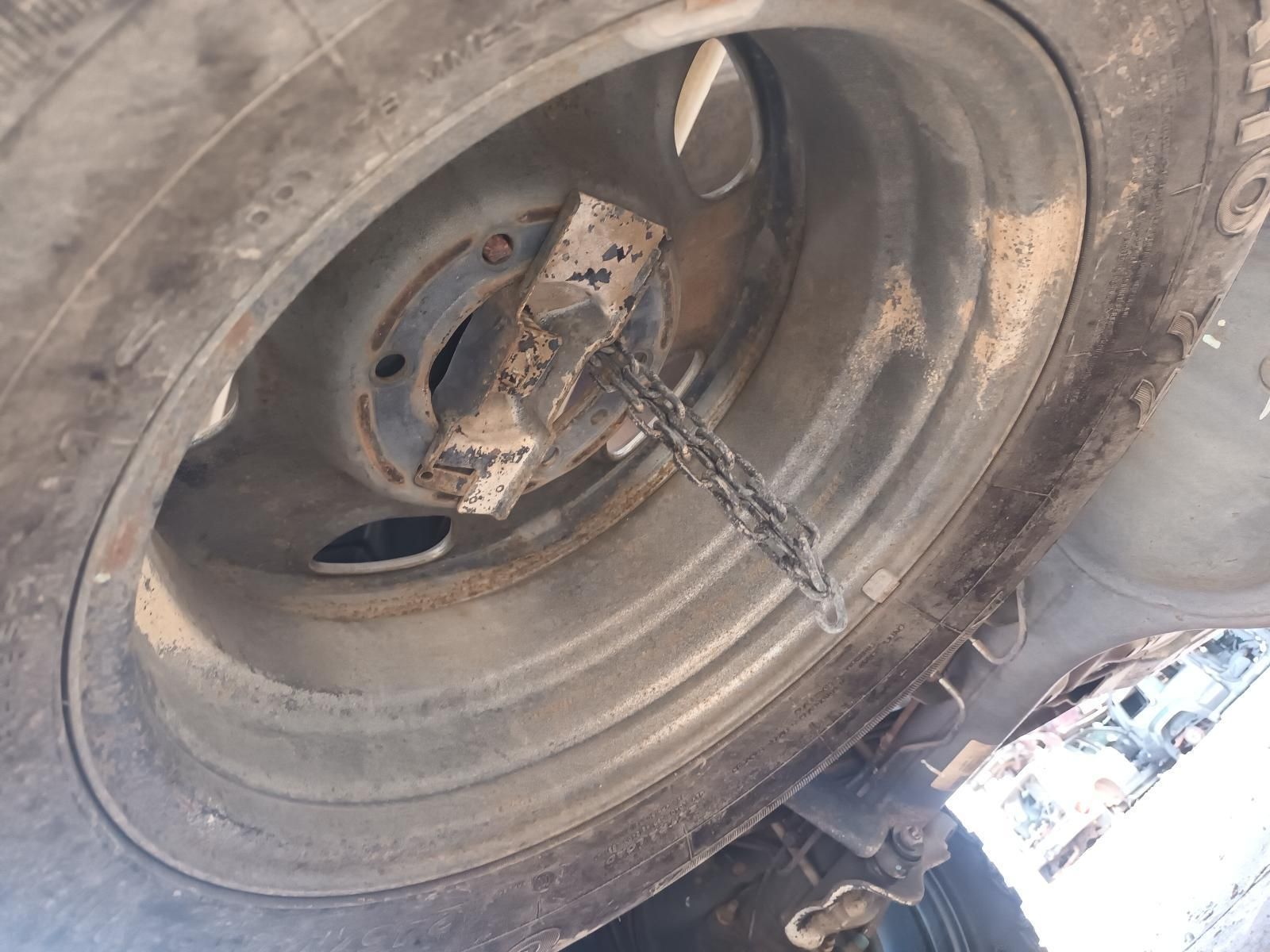 A Close Up of a Tire with a Chain Attached to It — South West 4WD Wreckers In Brisbane, QLD