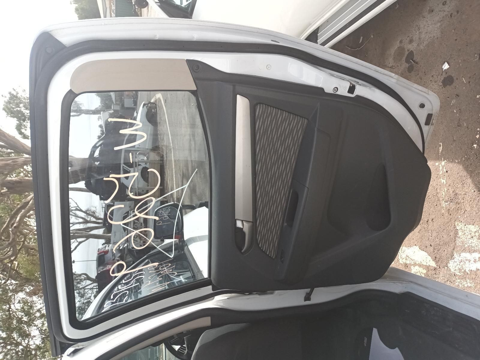 The Back Door of a White Car with the Door Open — South West 4WD Wreckers In Brisbane, QLD