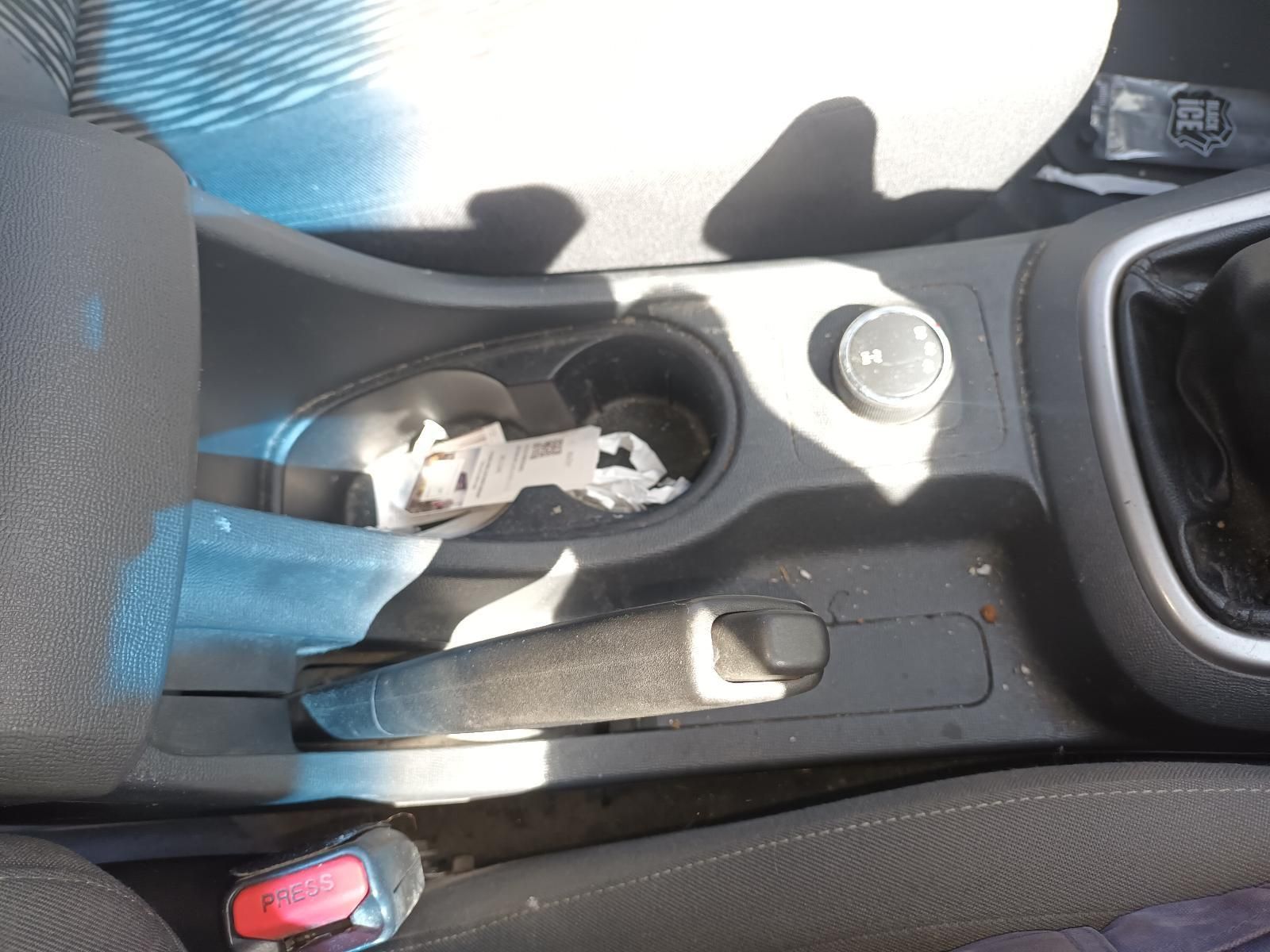 A Car Console with a Bottle of Water in It — South West 4WD Wreckers In Brisbane, QLD
