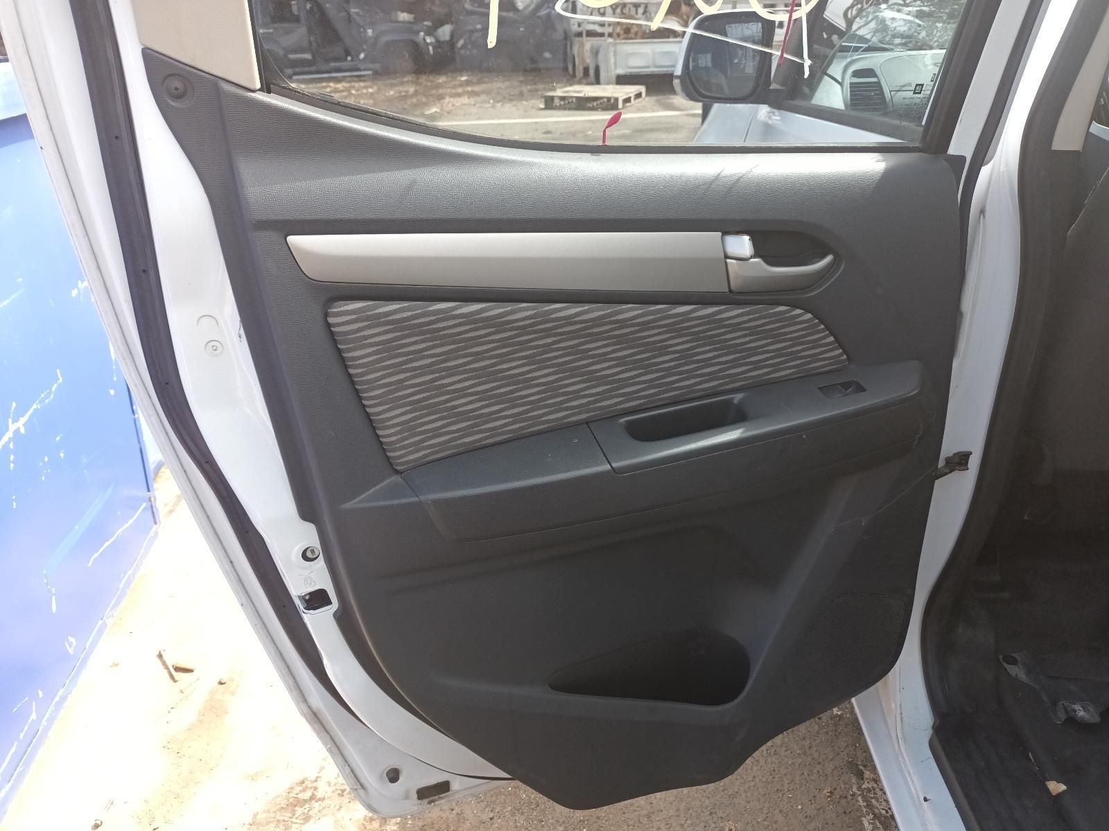 The Door of a White Car is Open and Sitting on the Ground — South West 4WD Wreckers In Brisbane, QLD