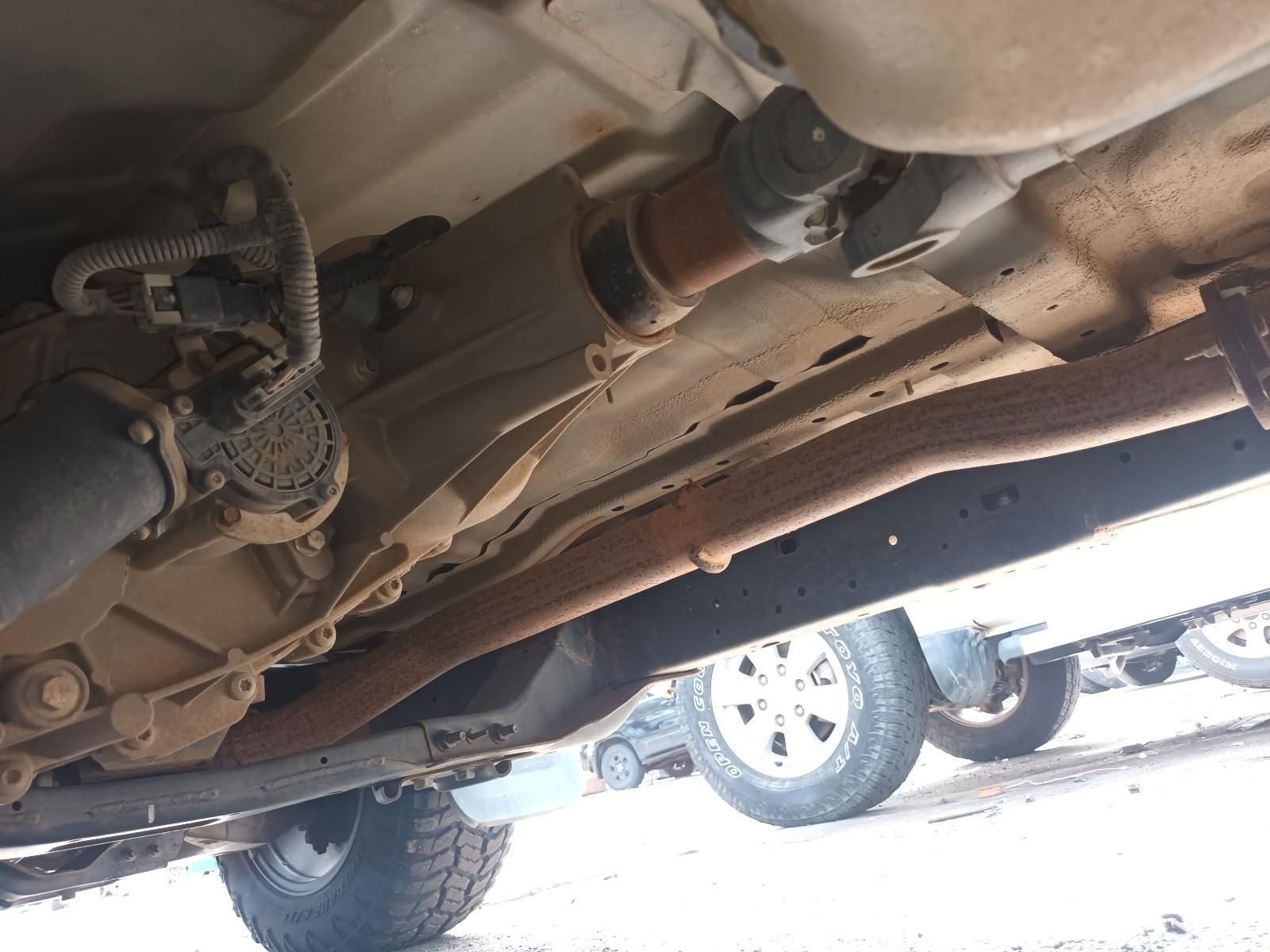 The Underside of a Truck is Shown in a Parking Lot — South West 4WD Wreckers In Brisbane, QLD