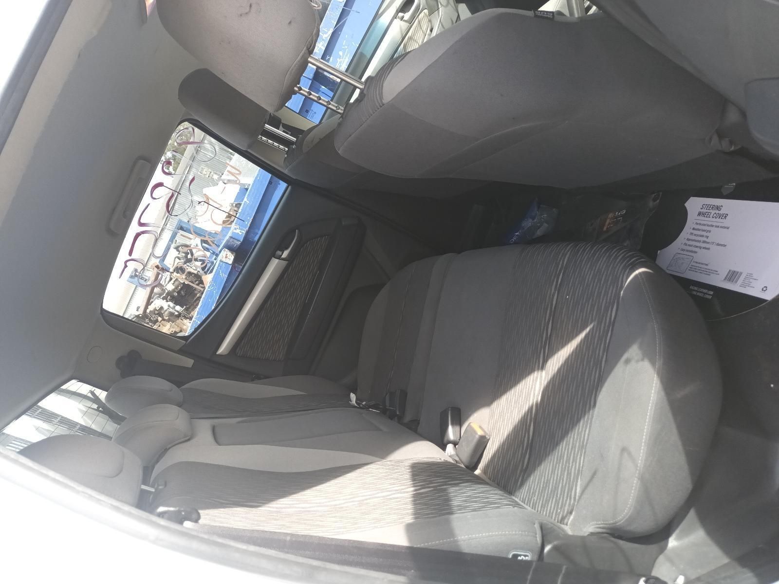 The Back Seat of a White Car is Shown — South West 4WD Wreckers In Brisbane, QLD