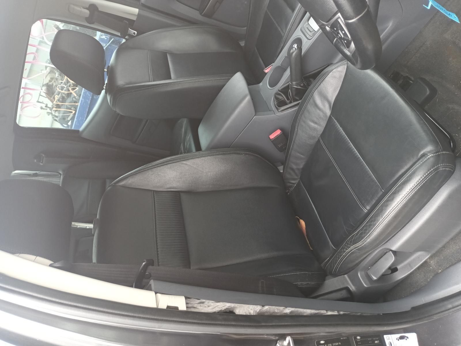 The Inside of a Car with a Black Leather Seat and a Steering Wheel — South West 4WD Wreckers In Brisbane, QLD