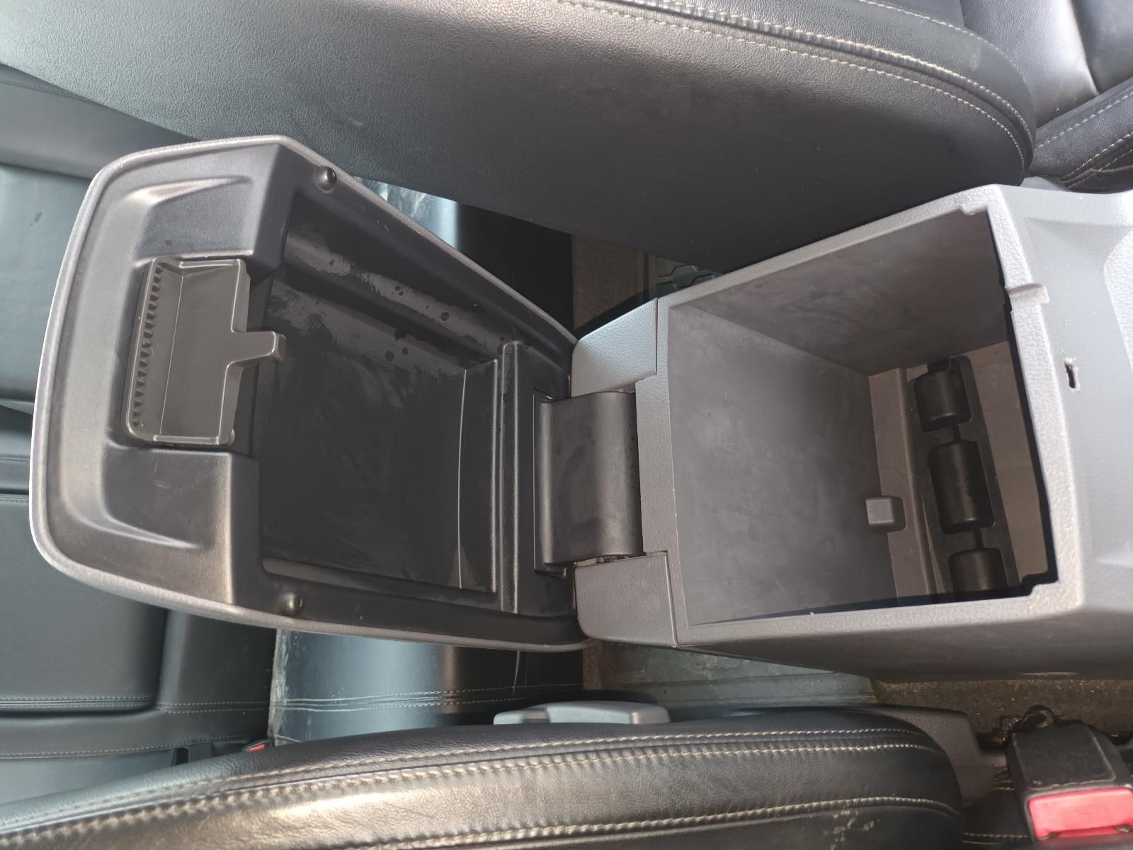 The Arm Rest of a Car with the Lid Open — South West 4WD Wreckers In Brisbane, QLD 