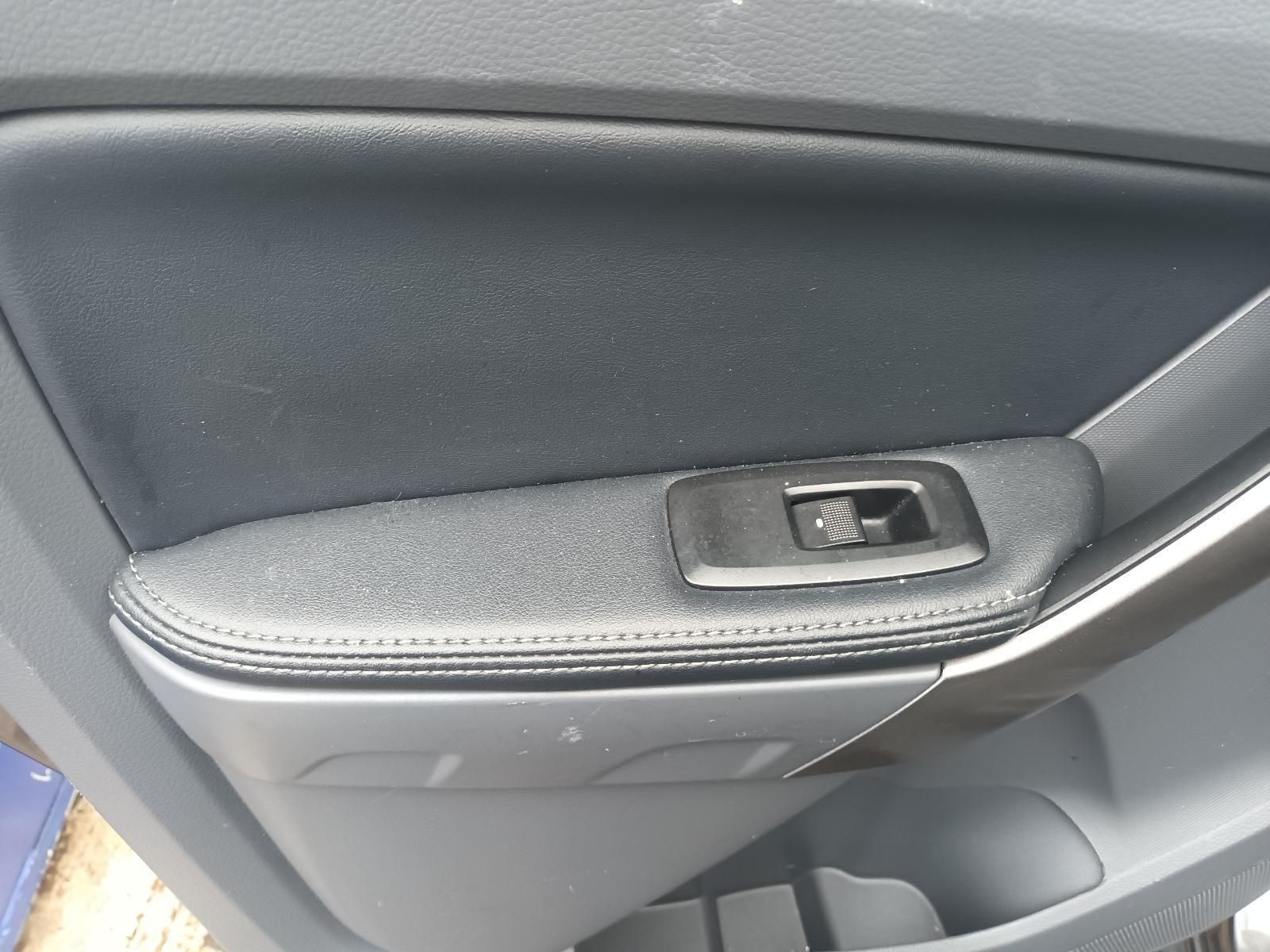 A Close Up of a Car Door with a Window Switch — South West 4WD Wreckers In Brisbane, QLD