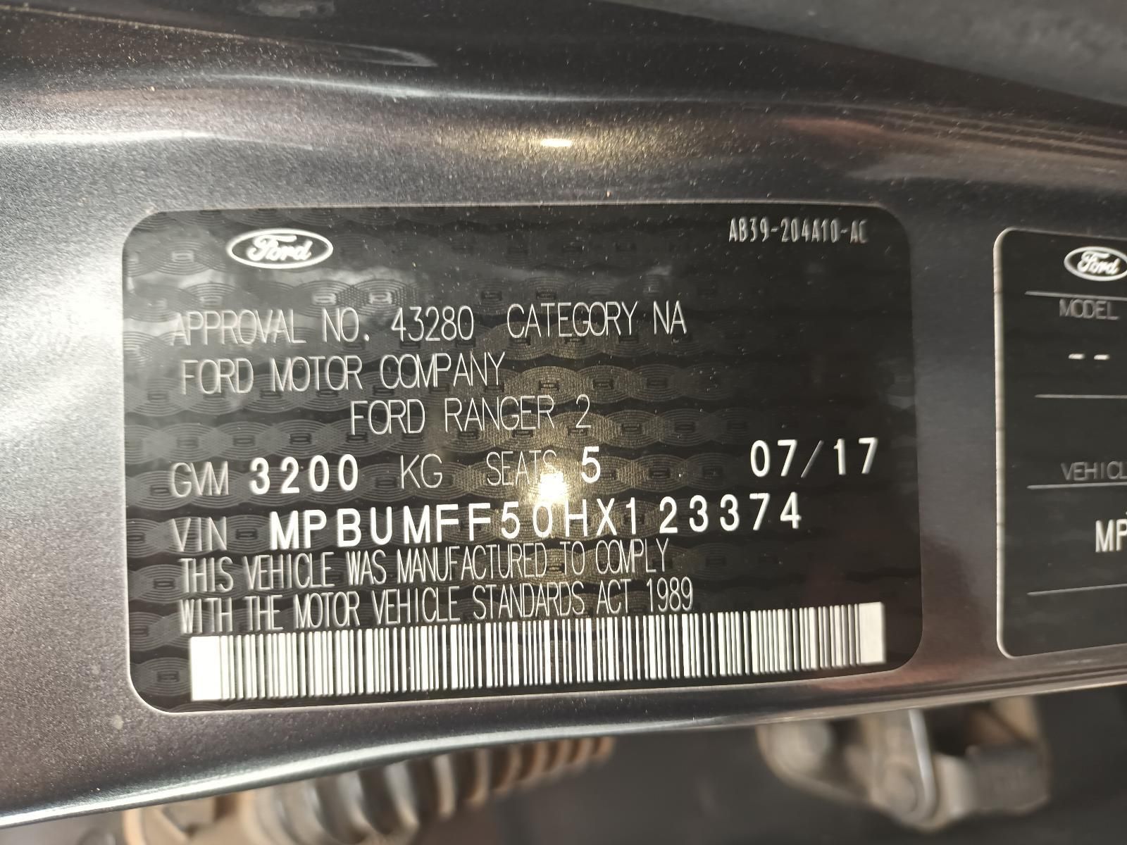 A Close Up of a Ford License Plate — South West 4WD Wreckers In Brisbane, QLD