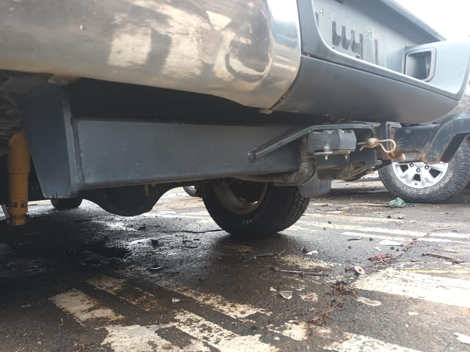 The Back End of a Truck is Shown in a Parking Lot — South West 4WD Wreckers In Brisbane, QLD