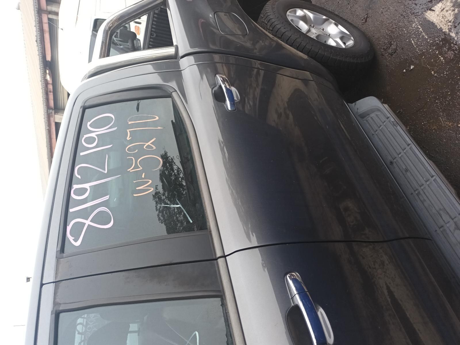 A Black Truck with the Number 81992190 Written on the Window— South West 4WD Wreckers In Brisbane, QLD