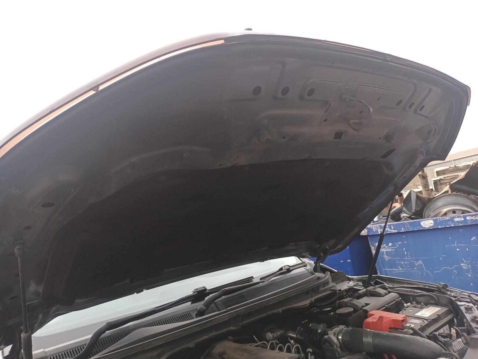 The Hood of a Car is Open and the Engine is Visible — South West 4WD Wreckers In Brisbane, QLD