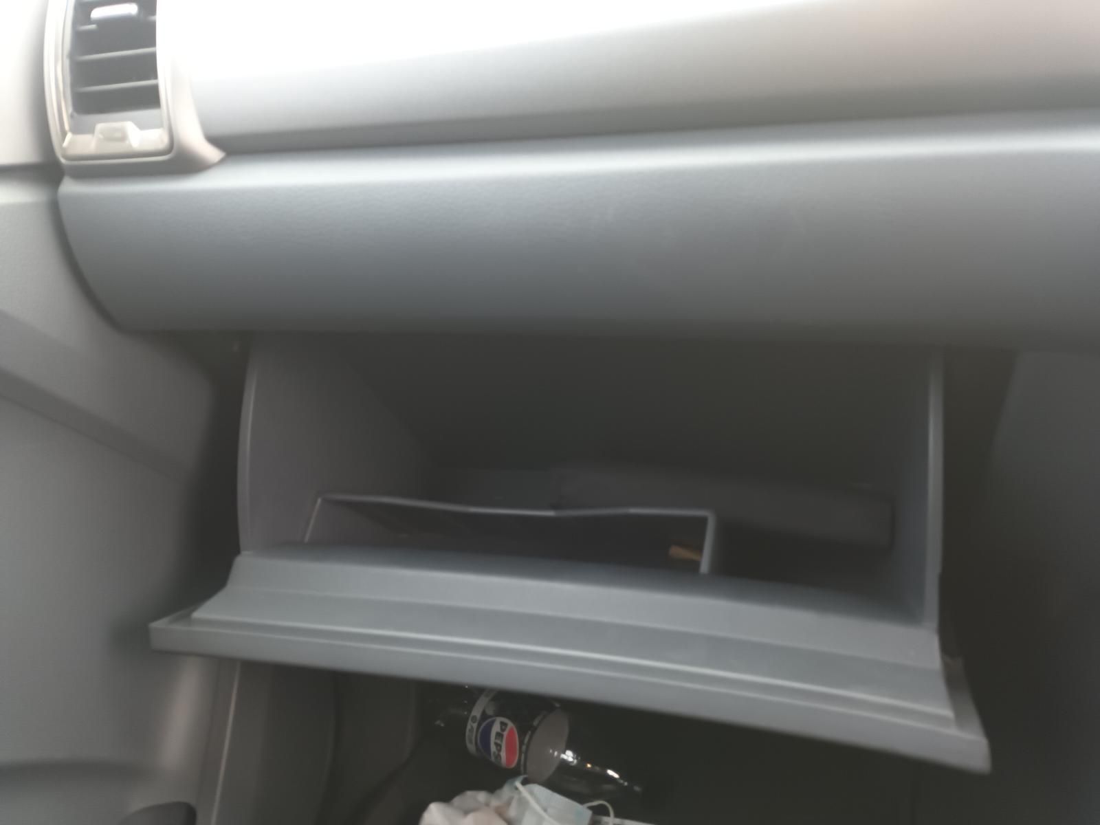 A Glove Box in a Car with a Bottle of Wine in It — South West 4WD Wreckers In Brisbane, QLD