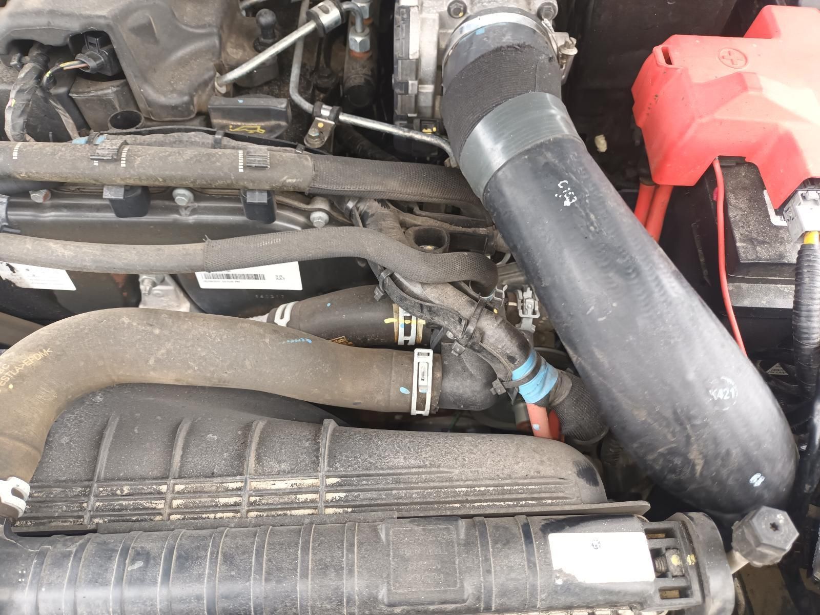 A Close Up of a Car Engine with a Red Battery — South West 4WD Wreckers In Brisbane, QLD