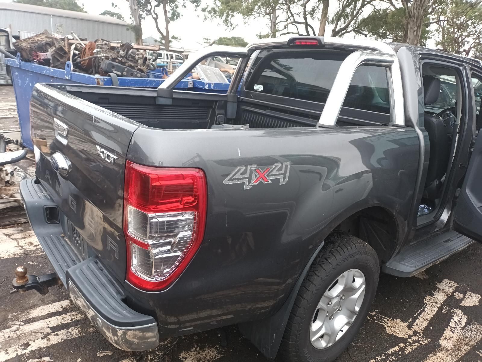 A Ford Ranger Pickup Truck is Parked in a Parking Lot — South West 4WD Wreckers In Brisbane, QLD