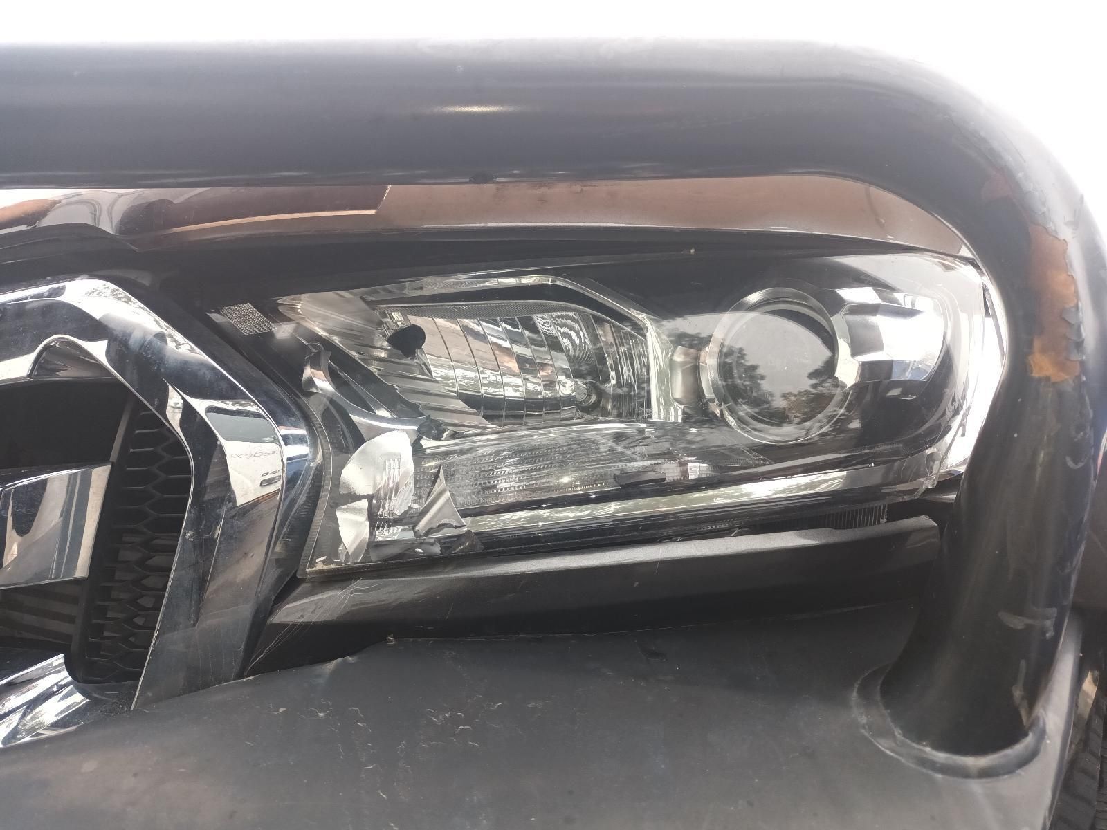 A Close Up of a Car Headlight on a White Background — South West 4WD Wreckers In Brisbane, QLD