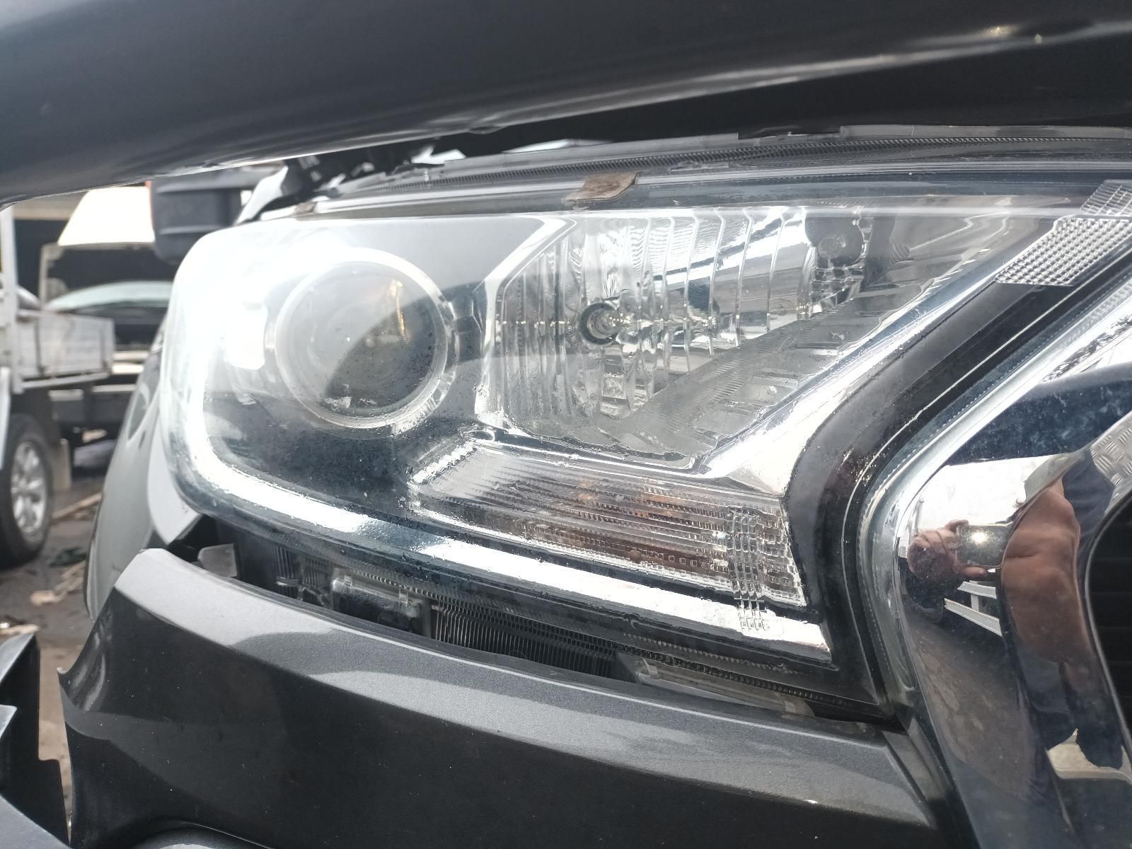 A Close Up of a Car 's Headlight on a Sunny Day — South West 4WD Wreckers In Brisbane, QLD