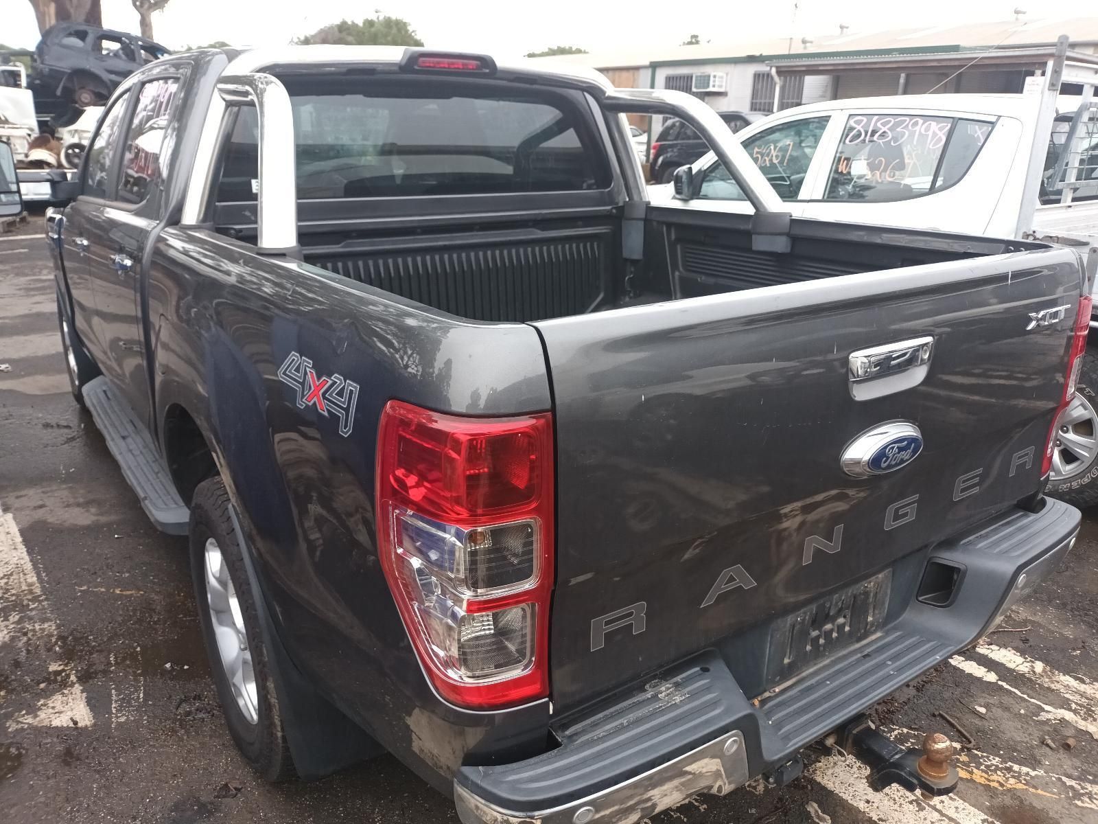 A Ford Ranger Truck is Parked in a Parking Lot — South West 4WD Wreckers In Brisbane, QLD