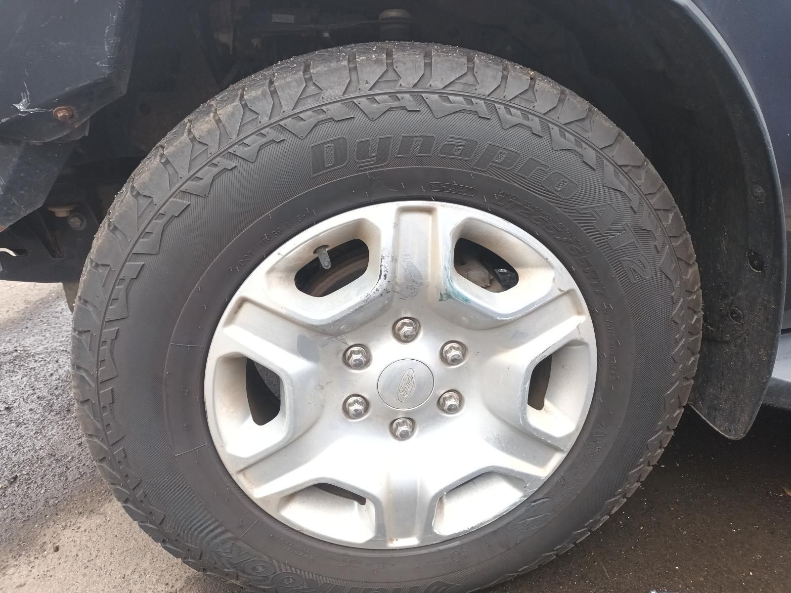 A Close Up of a Car Wheel with a Tire on It — South West 4WD Wreckers In Brisbane, QLD