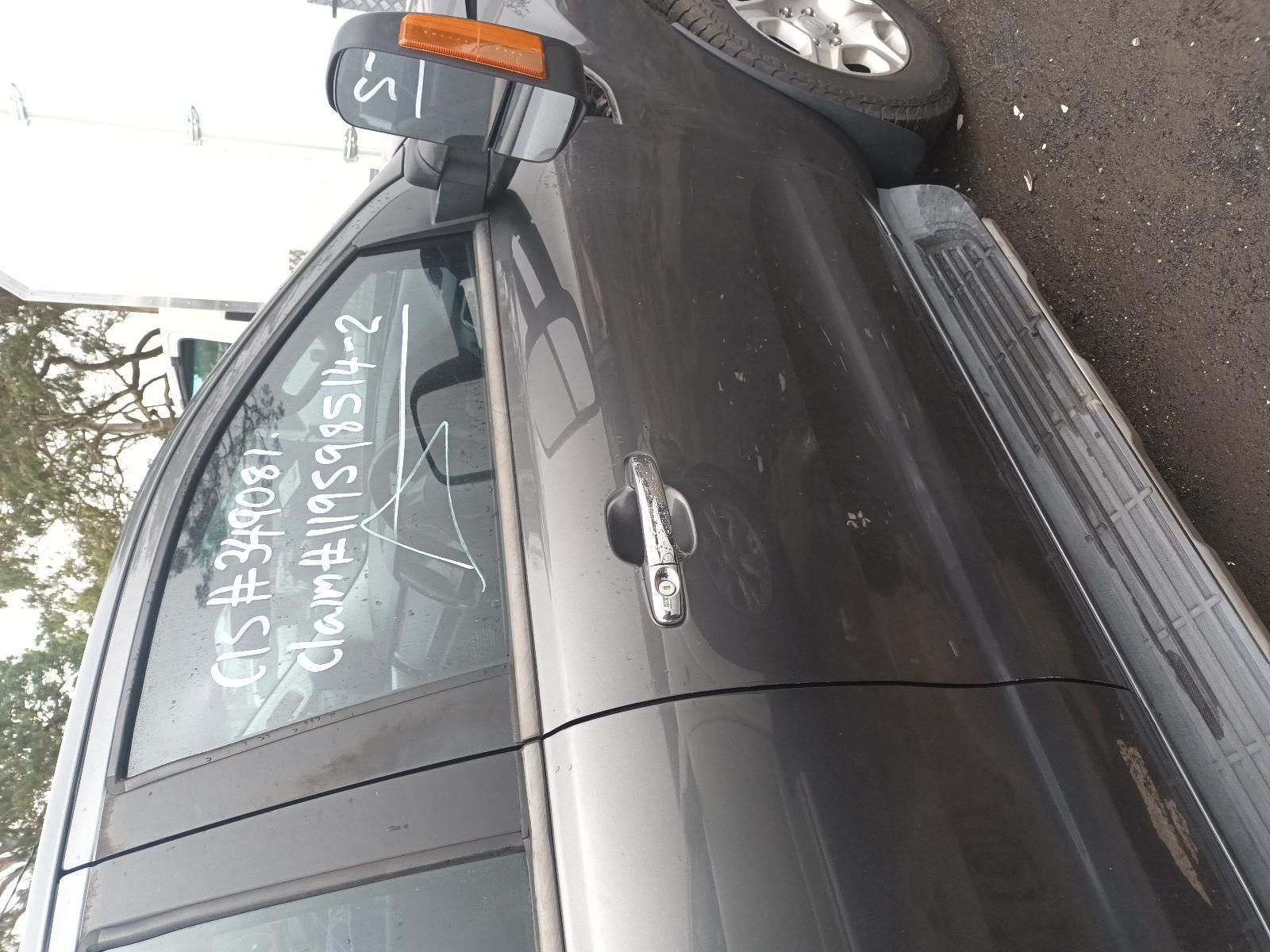 A Car is Parked on the Side of the Road — South West 4WD Wreckers In Brisbane, QLD