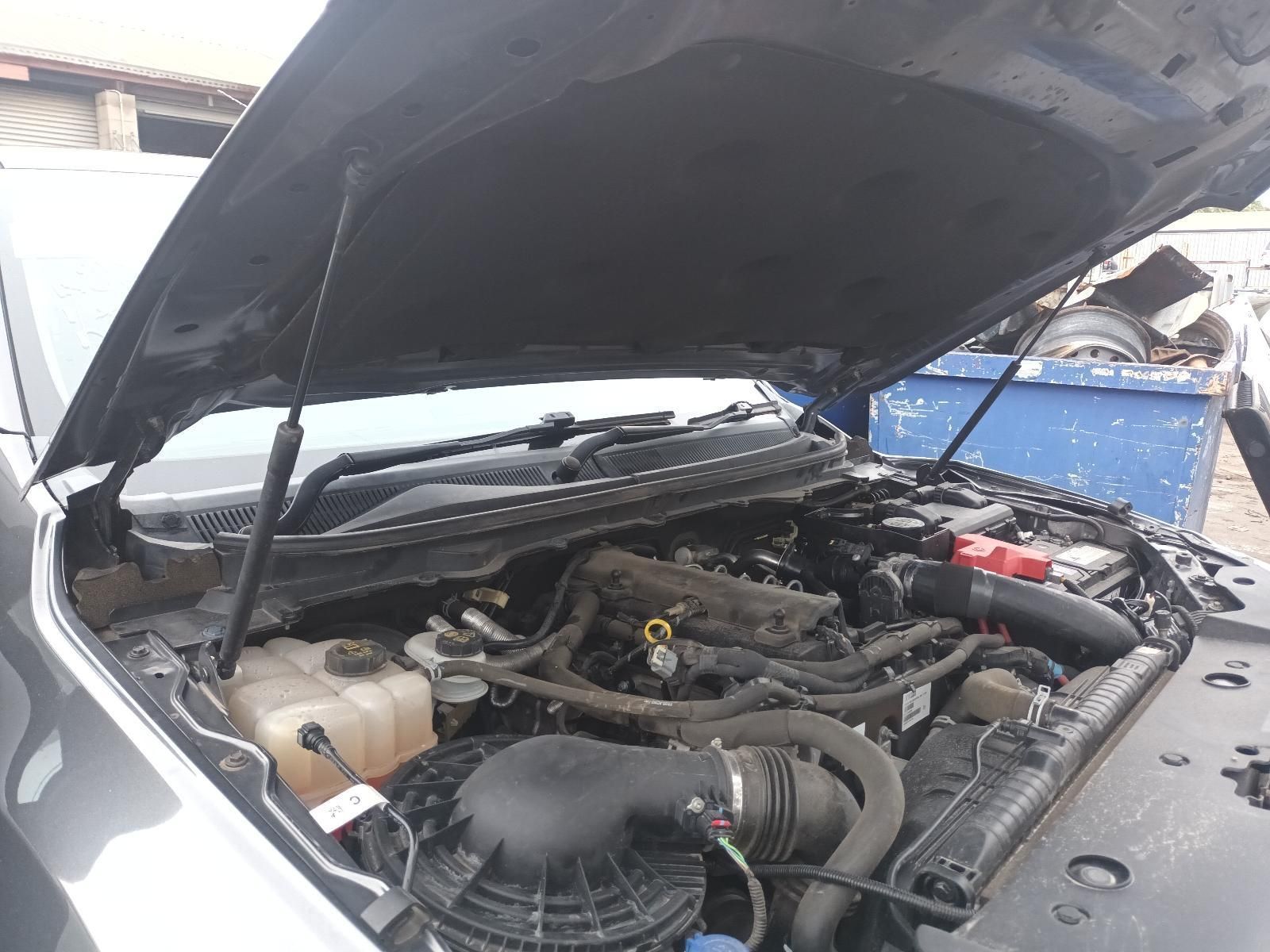The Hood of a Car is Open and Shows the Engine — South West 4WD Wreckers In Brisbane, QLD
