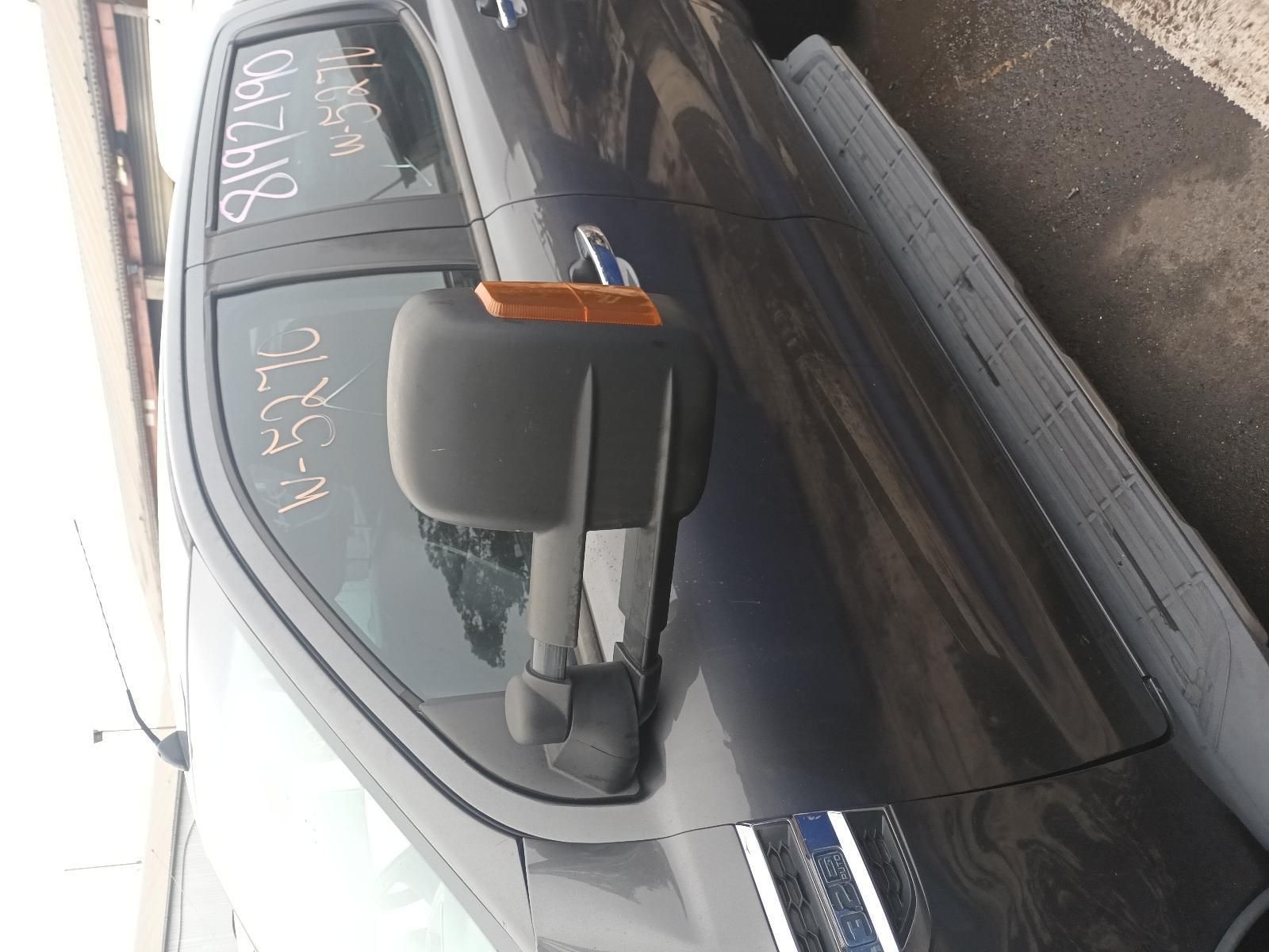 A Black Truck is Parked on the Side of the Road — South West 4WD Wreckers In Brisbane, QLD