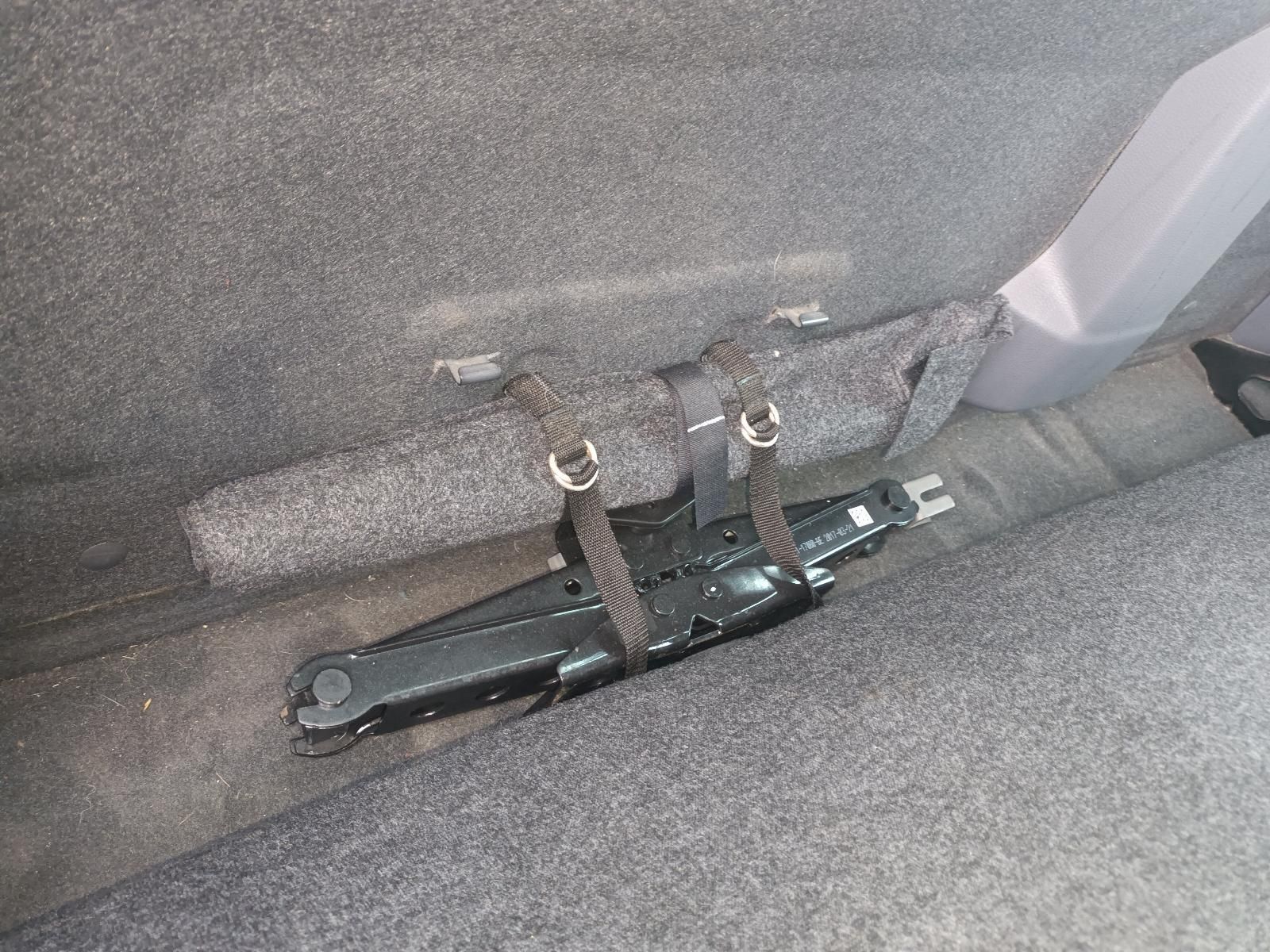A Jack is Attached to the Back Seat of a Car — South West 4WD Wreckers In Brisbane, QLD