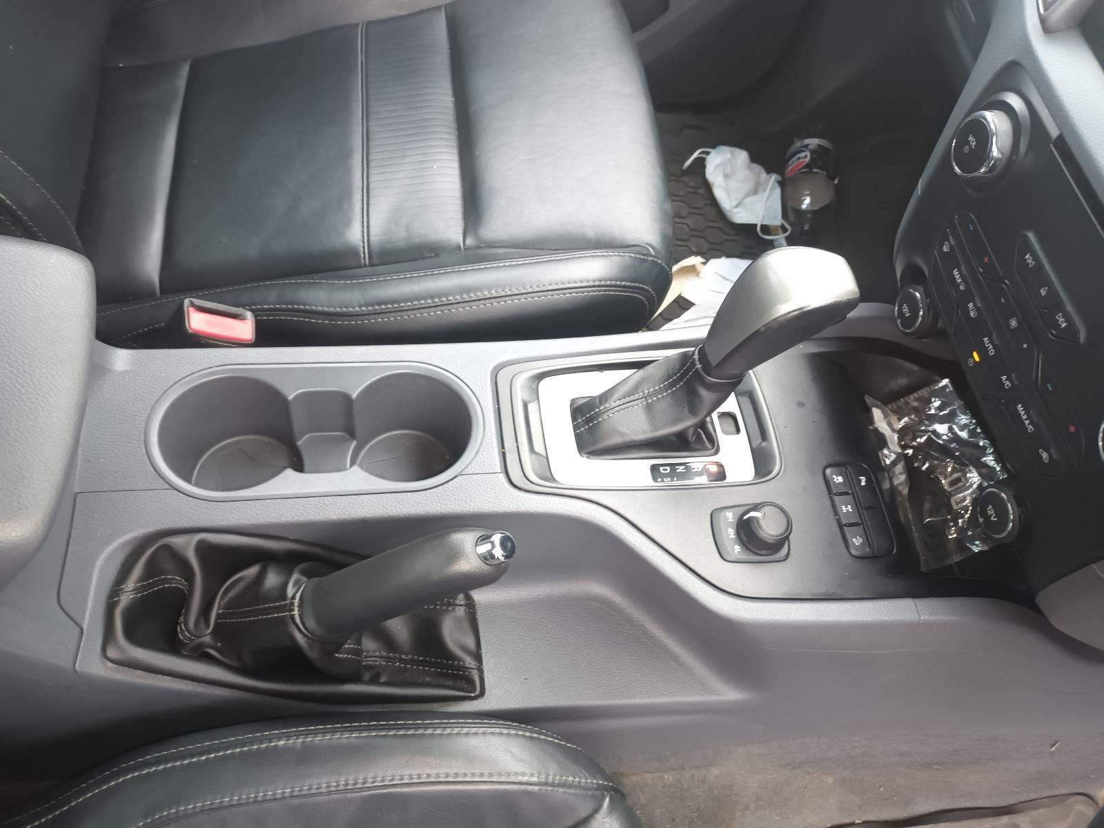 The Inside of a Car with a Shifter and a Cup Holder — South West 4WD Wreckers In Brisbane, QLD