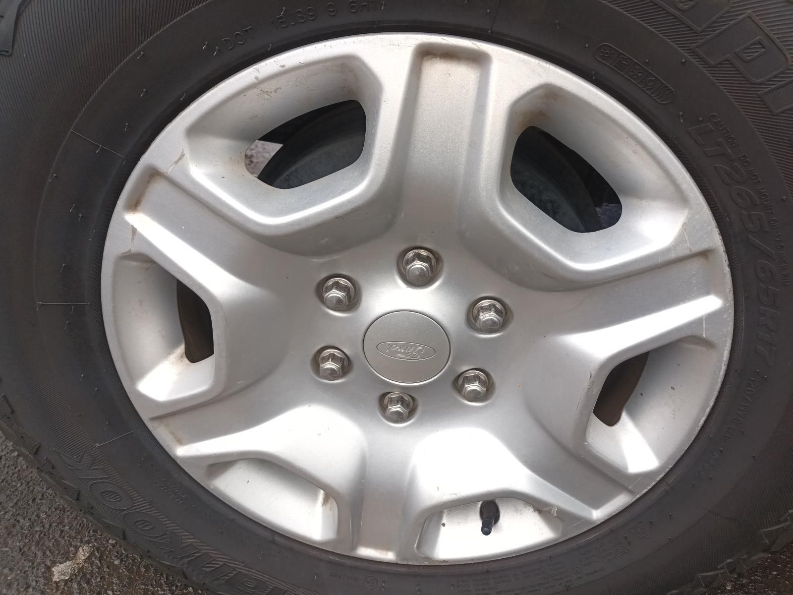 A Close Up of a Car Wheel with a Tire on It — South West 4WD Wreckers In Brisbane, QLD