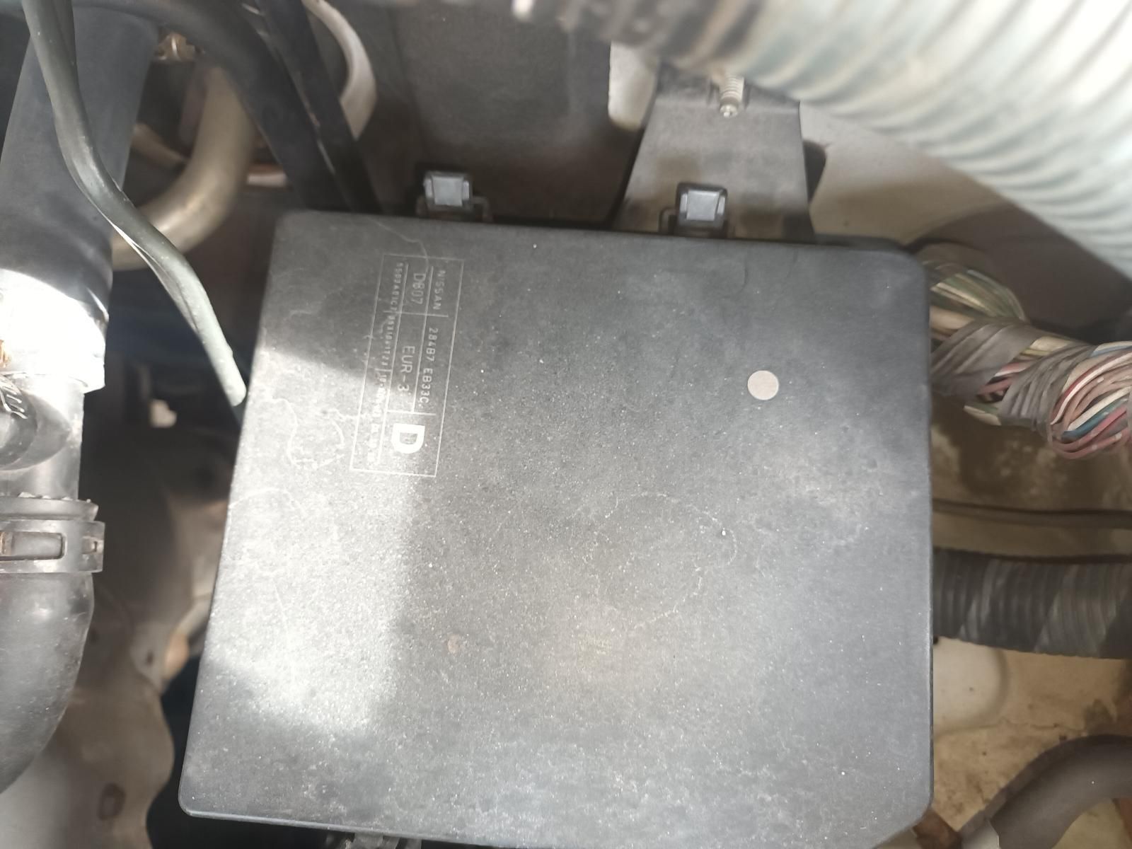 A Black Box is Sitting Under the Hood of a Car — South West 4WD Wreckers In Brisbane, QLD