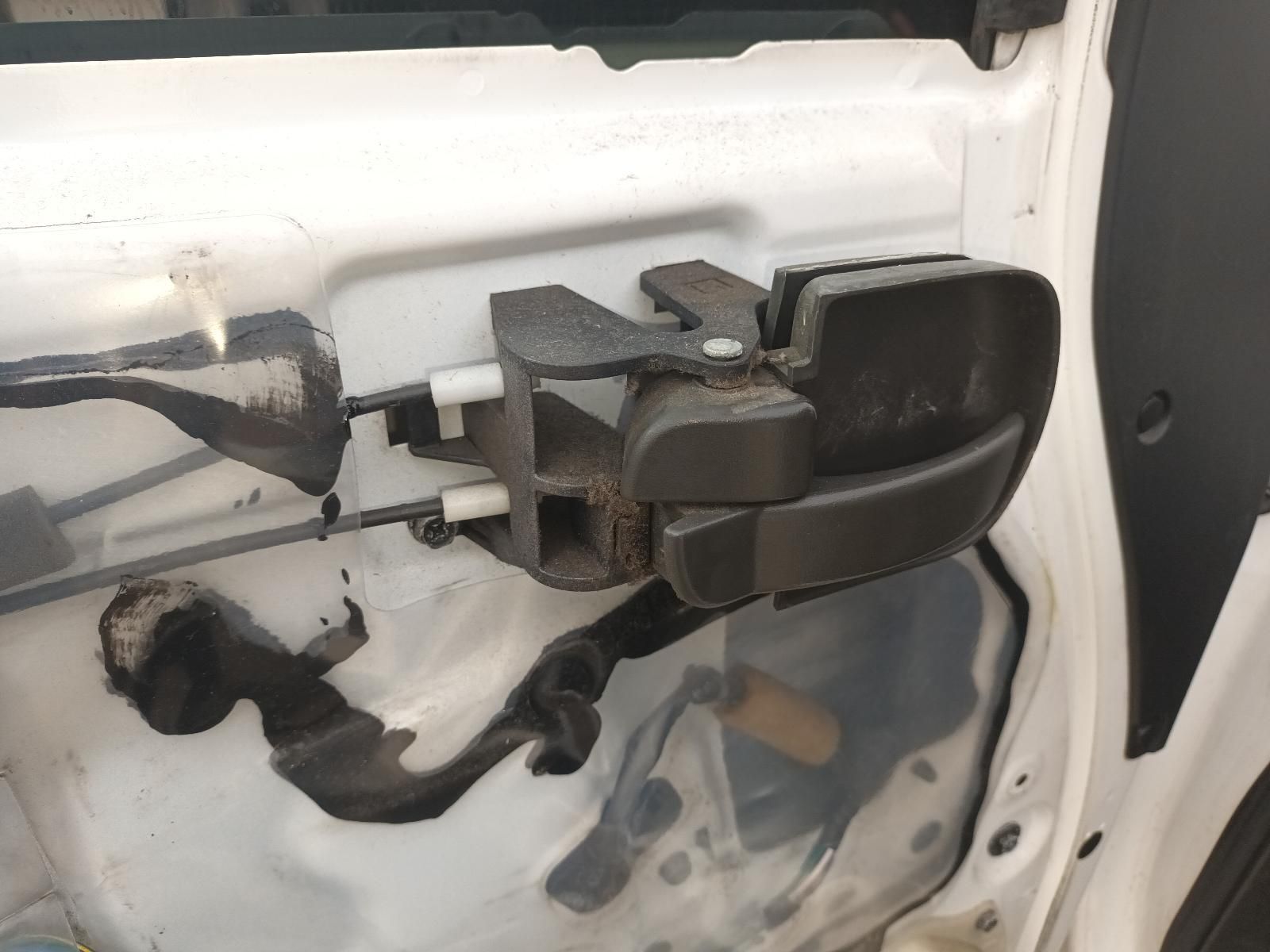 A Close Up of a Door Handle on a White Car — South West 4WD Wreckers In Brisbane, QLD