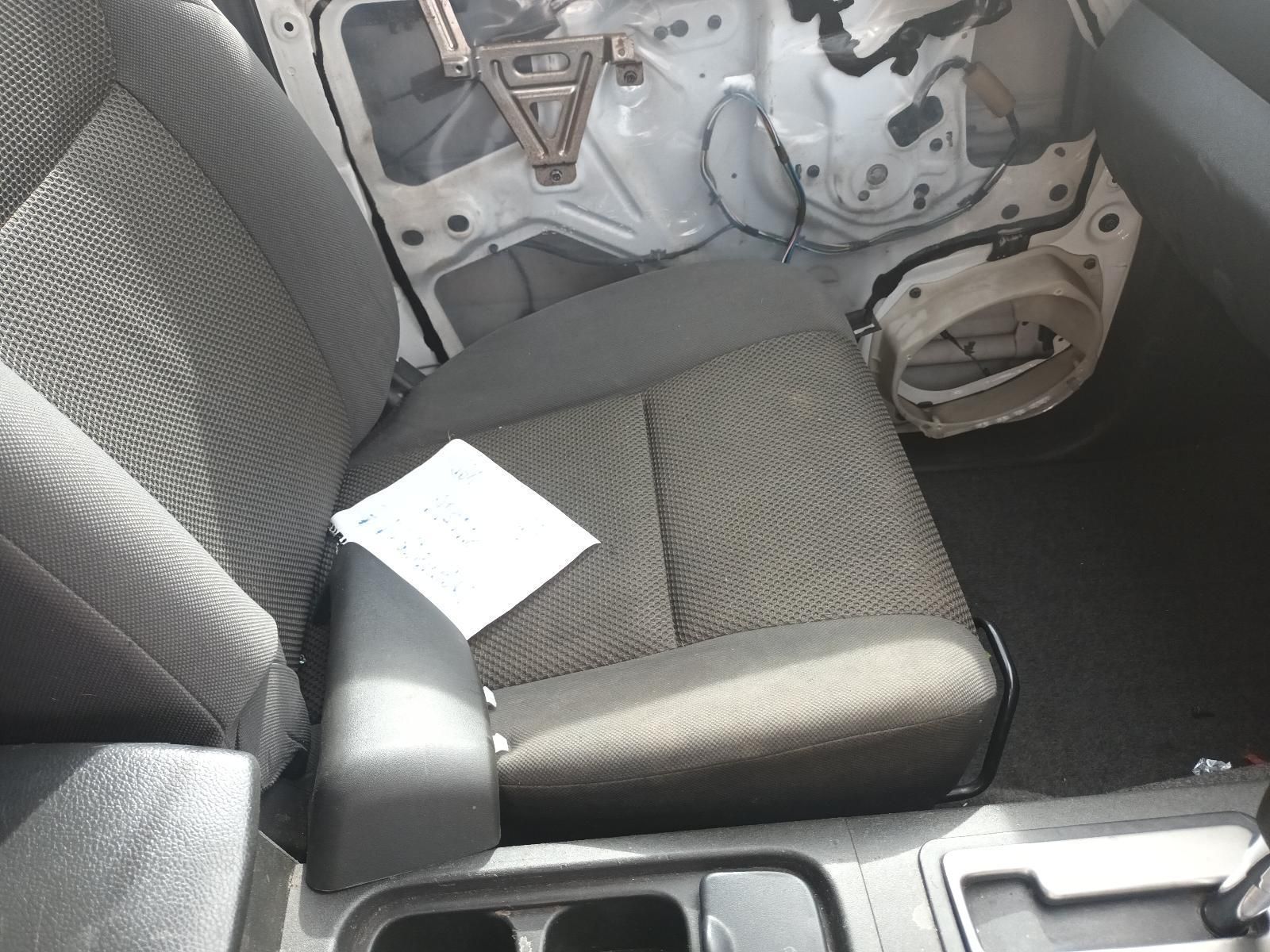 The Back Seat of a Car with a Piece of Paper on It — South West 4WD Wreckers In Brisbane, QLD