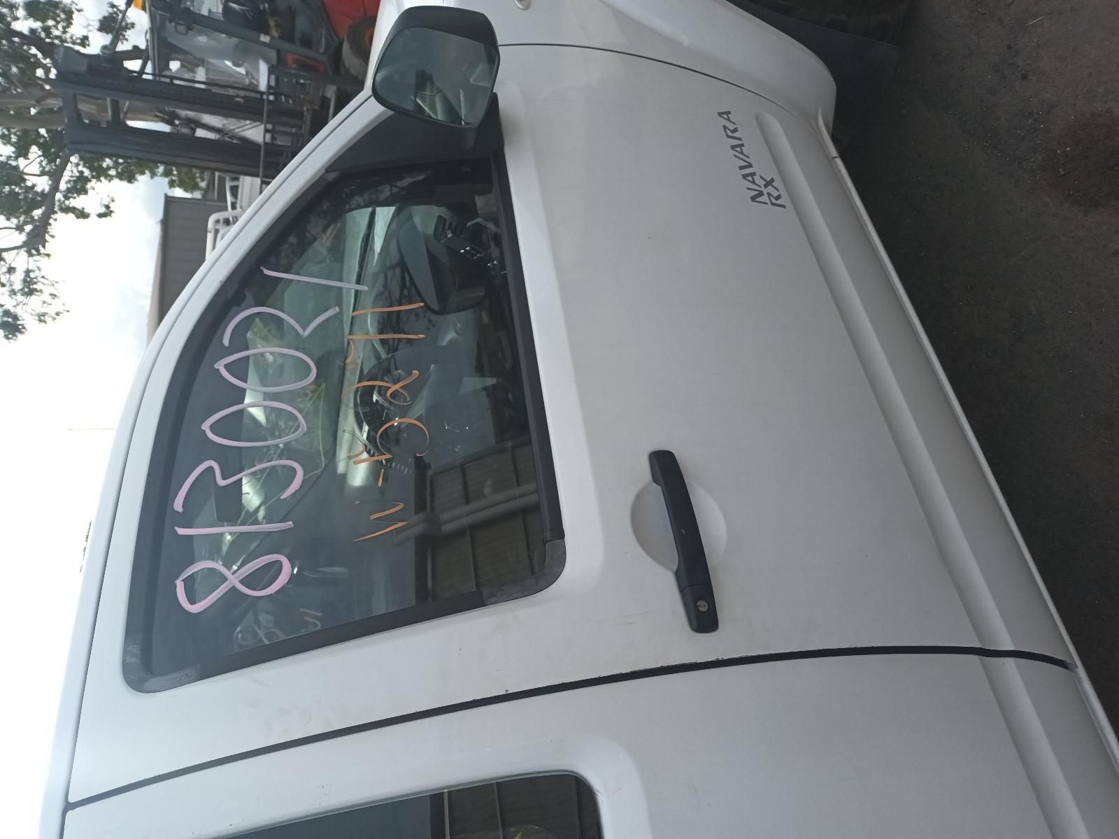 A White Truck is Parked on the Side of the Road — South West 4WD Wreckers In Brisbane, QLD