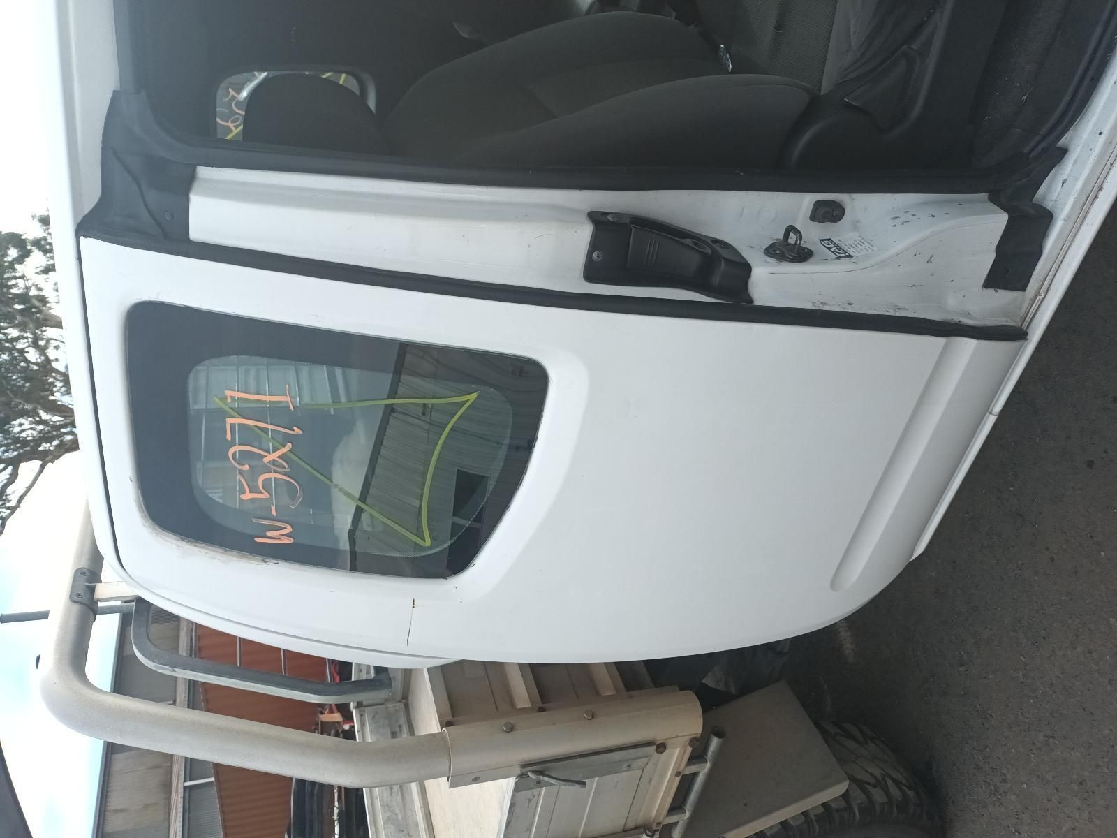 A White Truck with the Door Open Has a Numbers Written on the Window — South West 4WD Wreckers In Brisbane, QLD