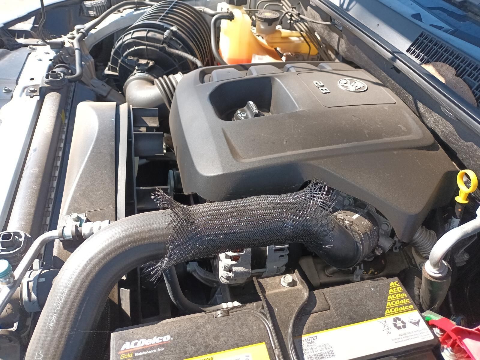 A Close Up of a Car Engine with an Acdelco Battery — South West 4WD Wreckers in Harristown, QLD