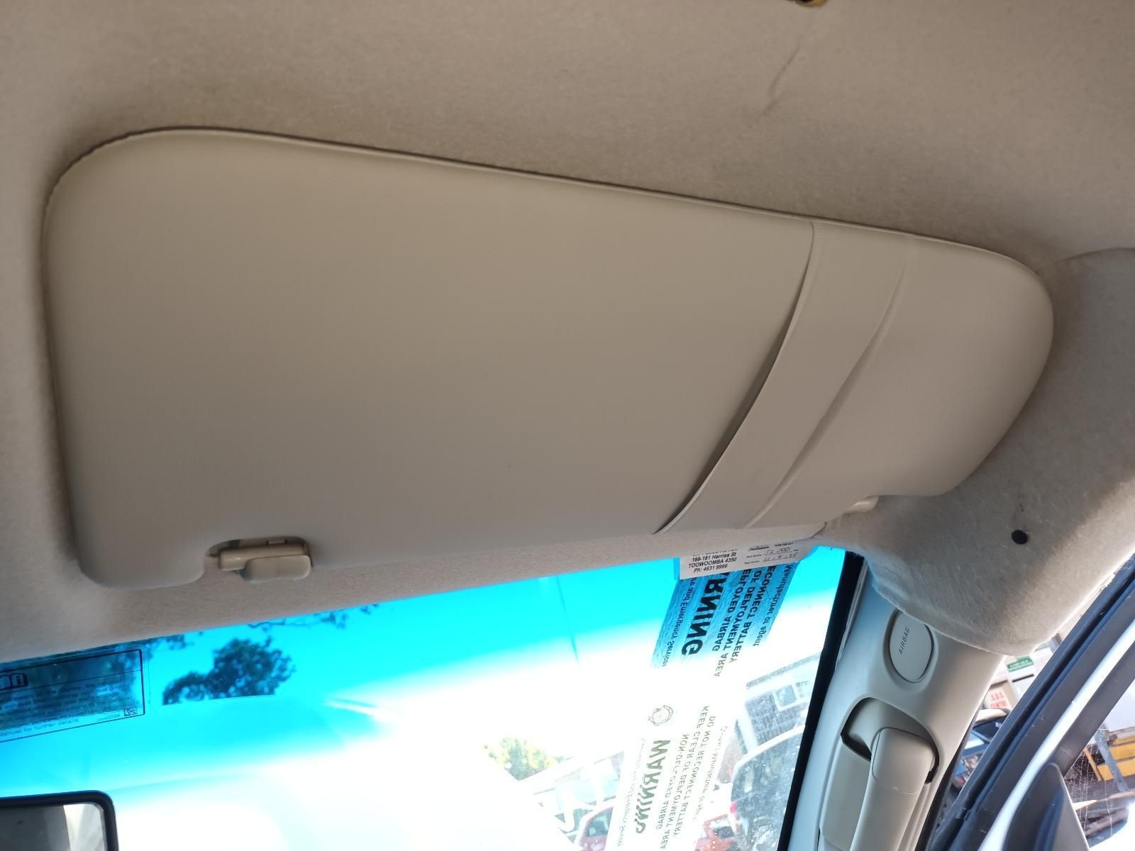 A Sun Visor is Hanging from the Ceiling of a Car — South West 4WD Wreckers in Harristown, QLD