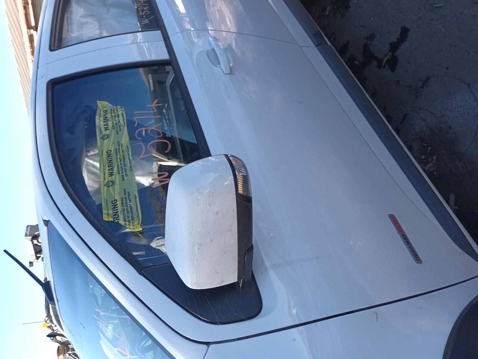 A White Truck with a Sticker on the Door — South West 4WD Wreckers in Harristown, QLD