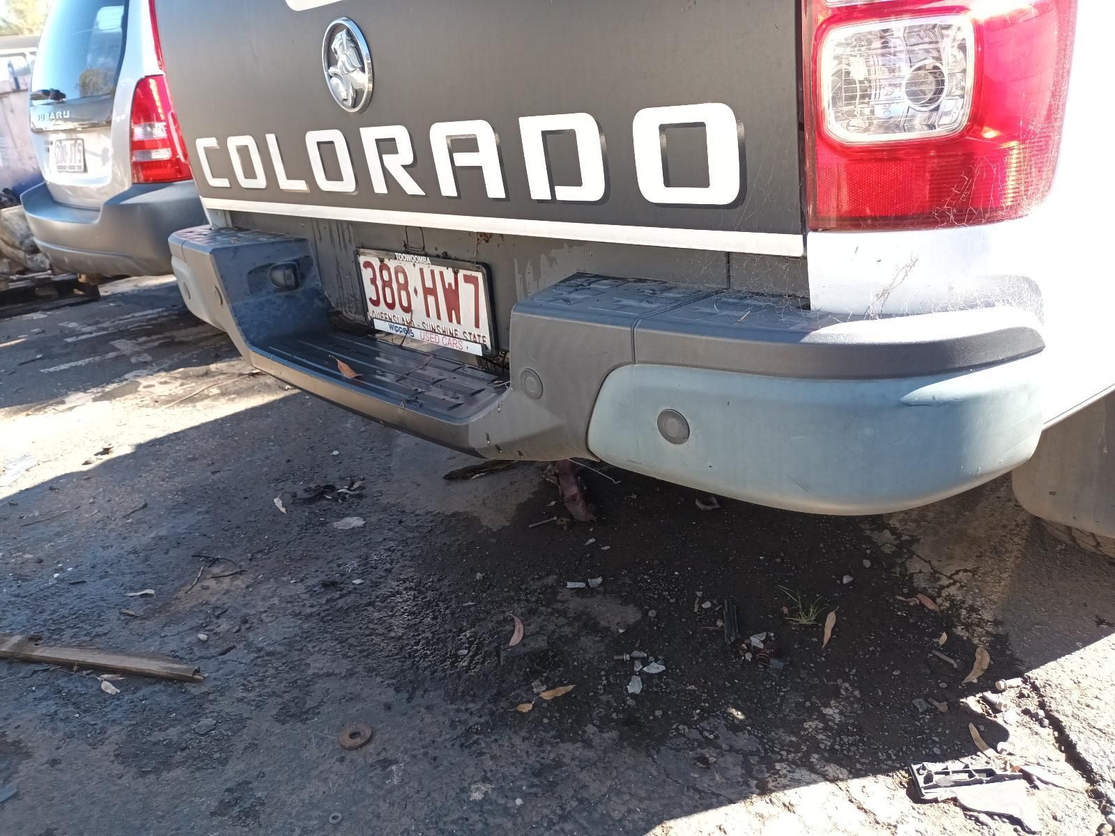 A Black Colorado Truck is Parked on the Side of the Road — South West 4WD Wreckers in Harristown, QLD