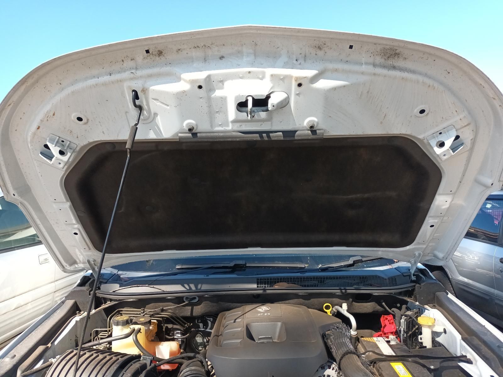 The Hood of a White Car is Open and Shows the Engine — South West 4WD Wreckers in Harristown, QLD
