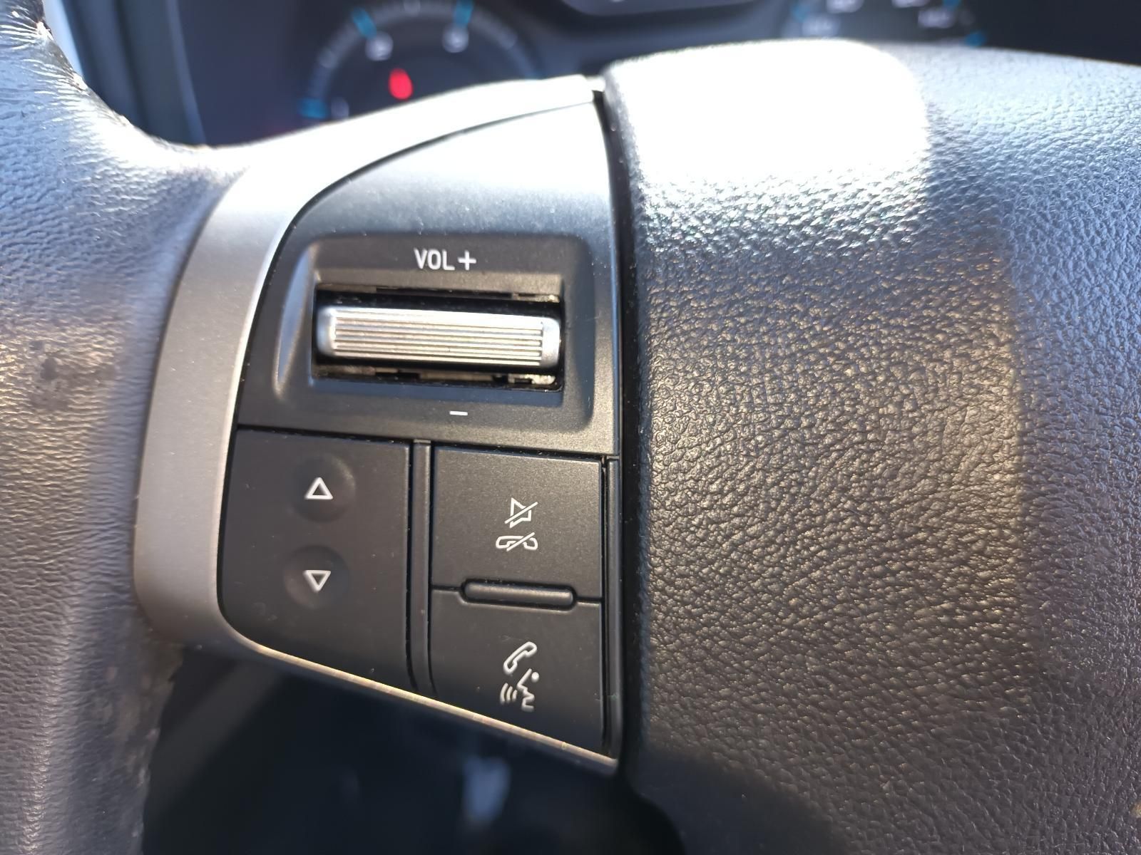 A Close Up of a Car Steering Wheel with a Volume Button — South West 4WD Wreckers in Harristown, QLD