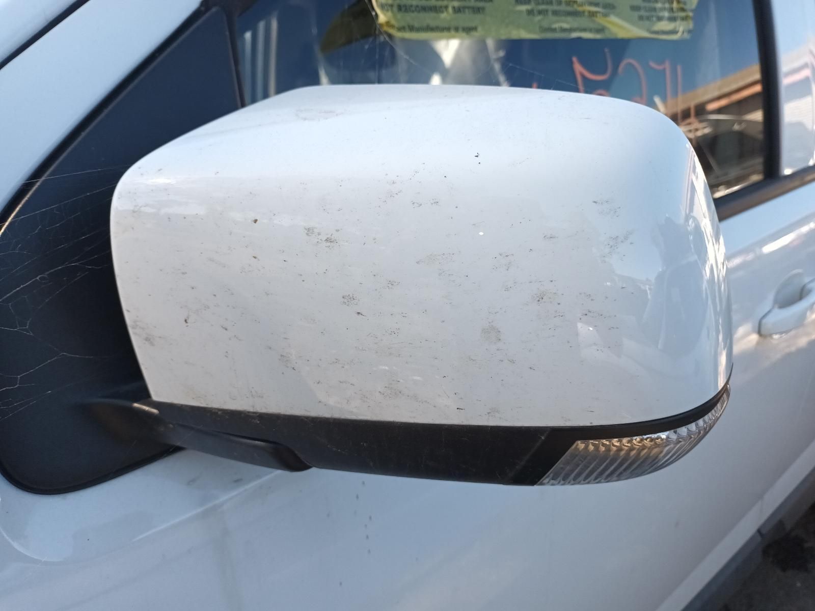 A Close Up of a White Car's Side Mirror — South West 4WD Wreckers in Harristown, QLD