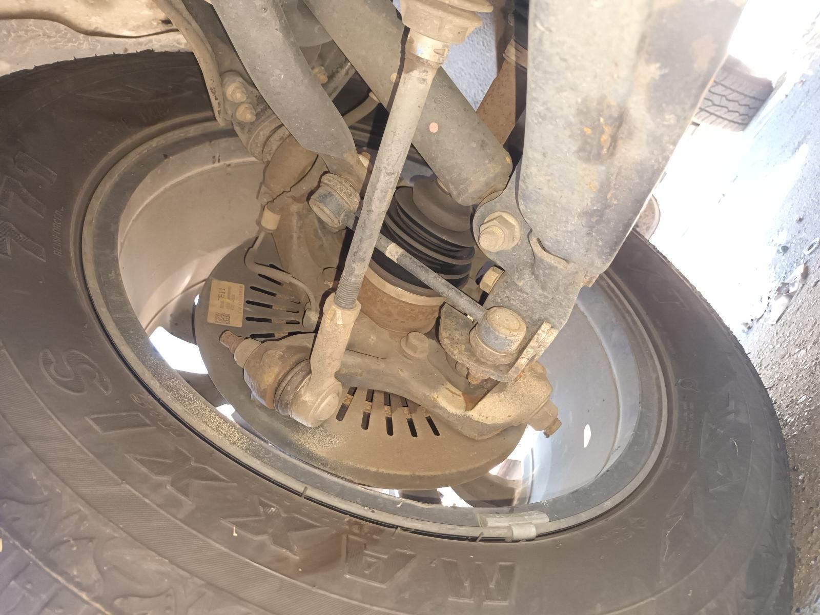 A Close Up of a Car Wheel with a Tire on It — South West 4WD Wreckers in Harristown, QLD
