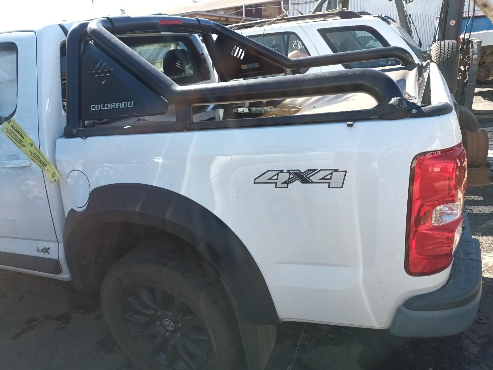 A White Truck with the Word 4x4 on the Side — South West 4WD Wreckers in Harristown, QLD