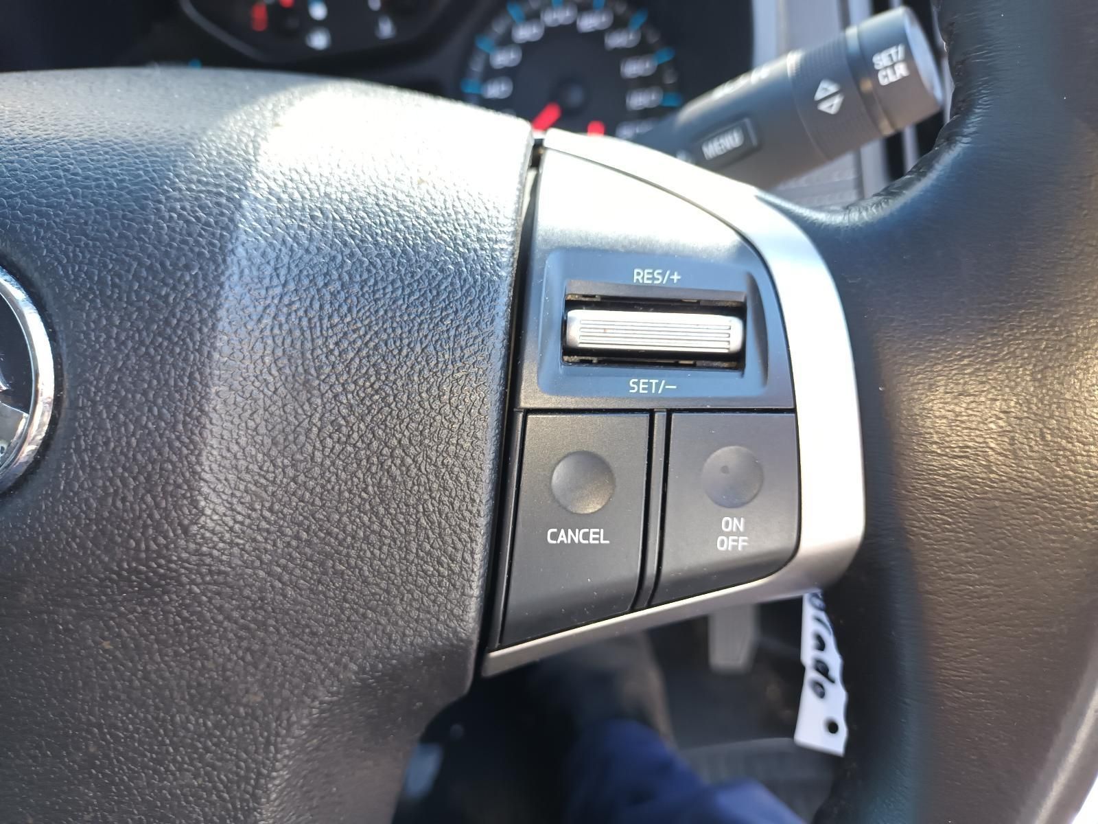 A Close Up of a Car Steering Wheel with a Cancel Button — South West 4WD Wreckers in Harristown, QLD