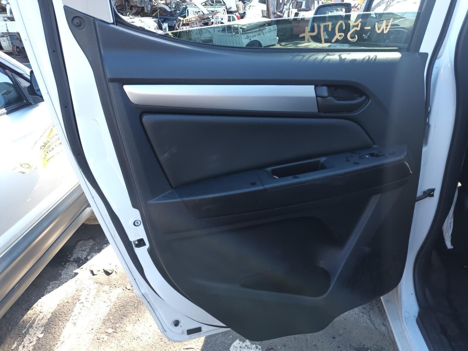 A White Car with the Door Open Has a Black Door Panel — South West 4WD Wreckers in Harristown, QLD