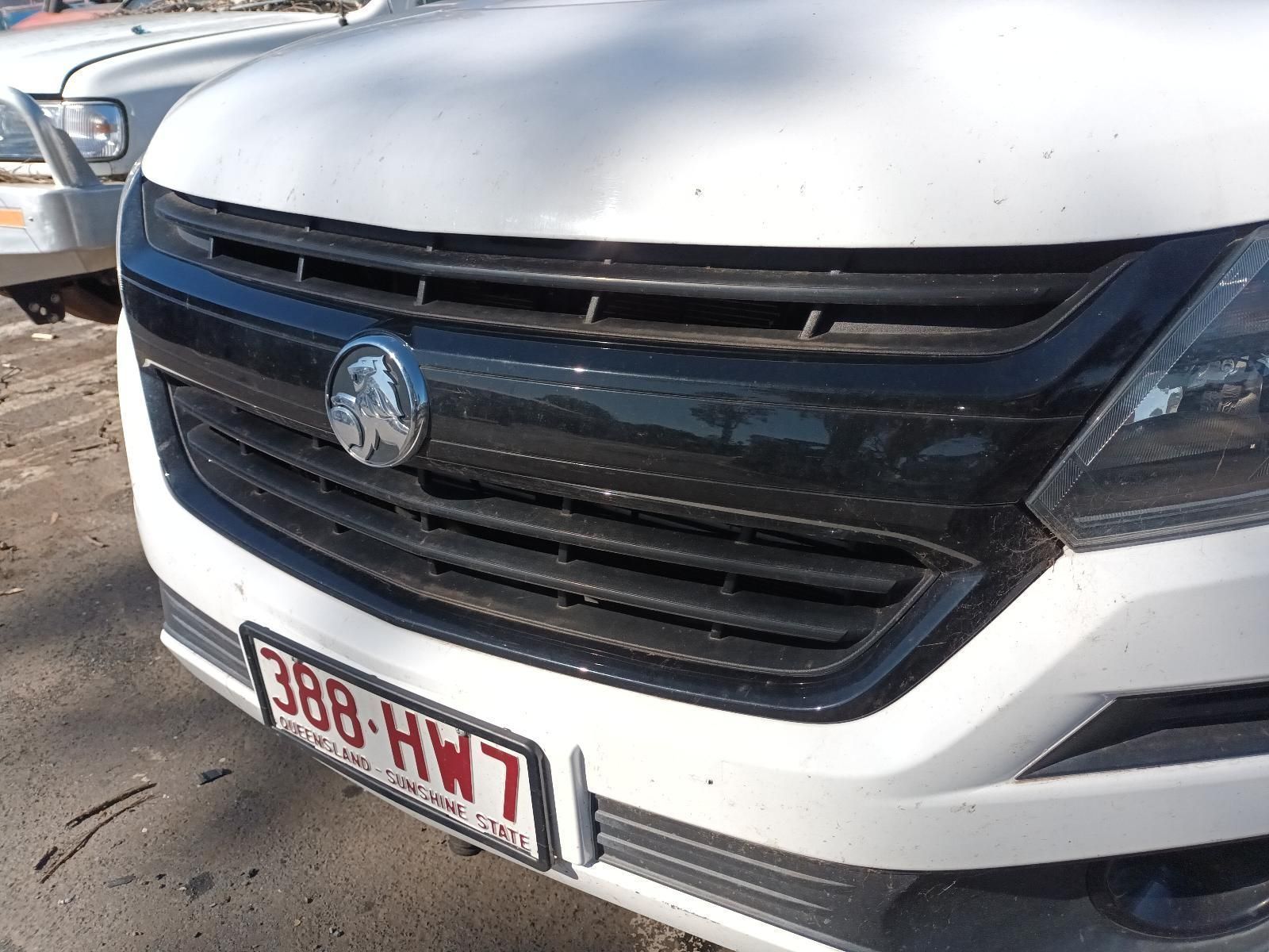 A White Car with a License Plate That Says 388-HW7 — South West 4WD Wreckers in Harristown, QLD
