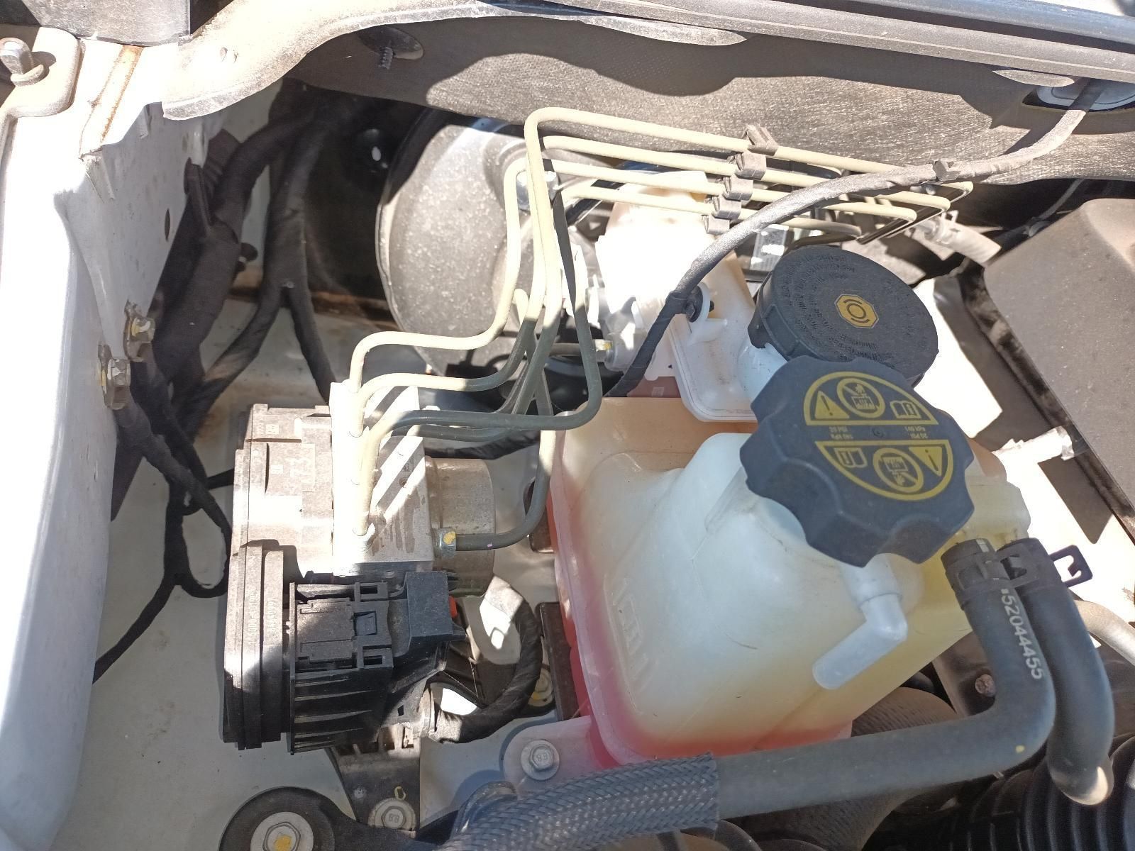 A Close Up of a Car Engine with a Brake Fluid Tank — South West 4WD Wreckers in Harristown, QLD