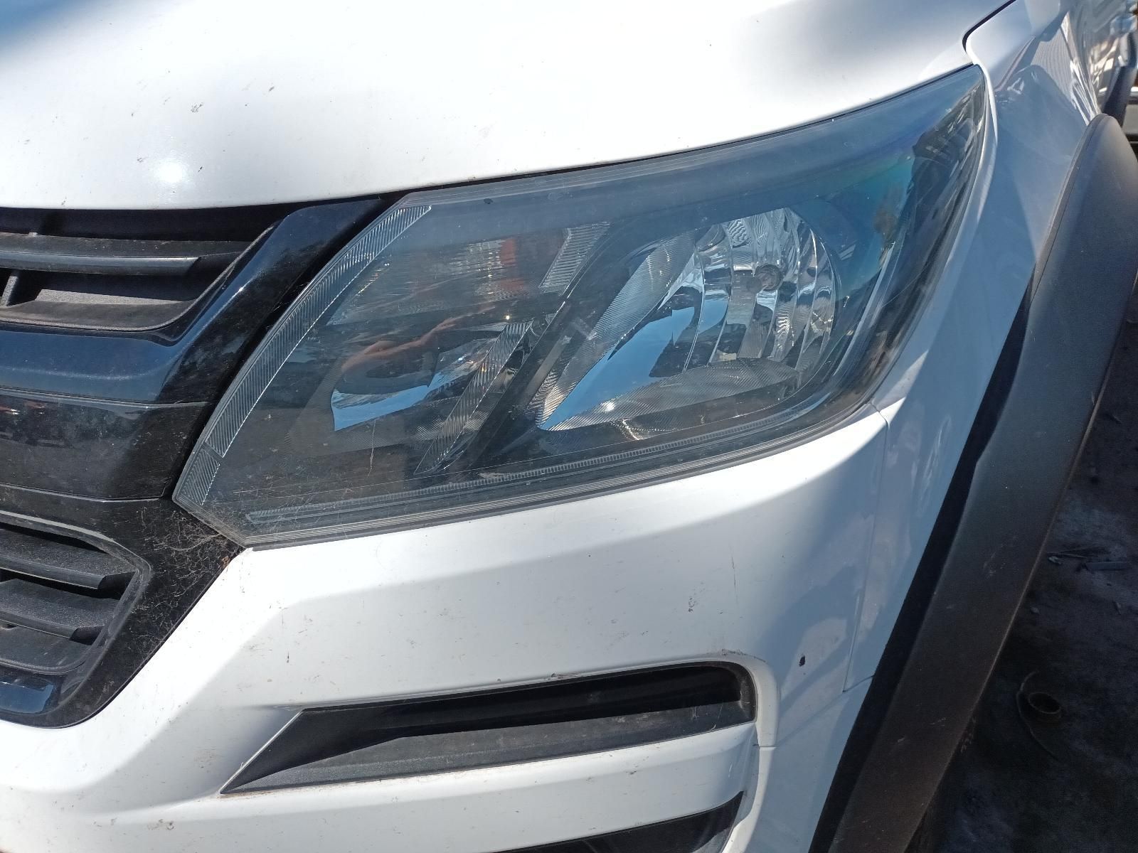 A Close Up of the Headlight of a Silver Car — South West 4WD Wreckers in Harristown, QLD