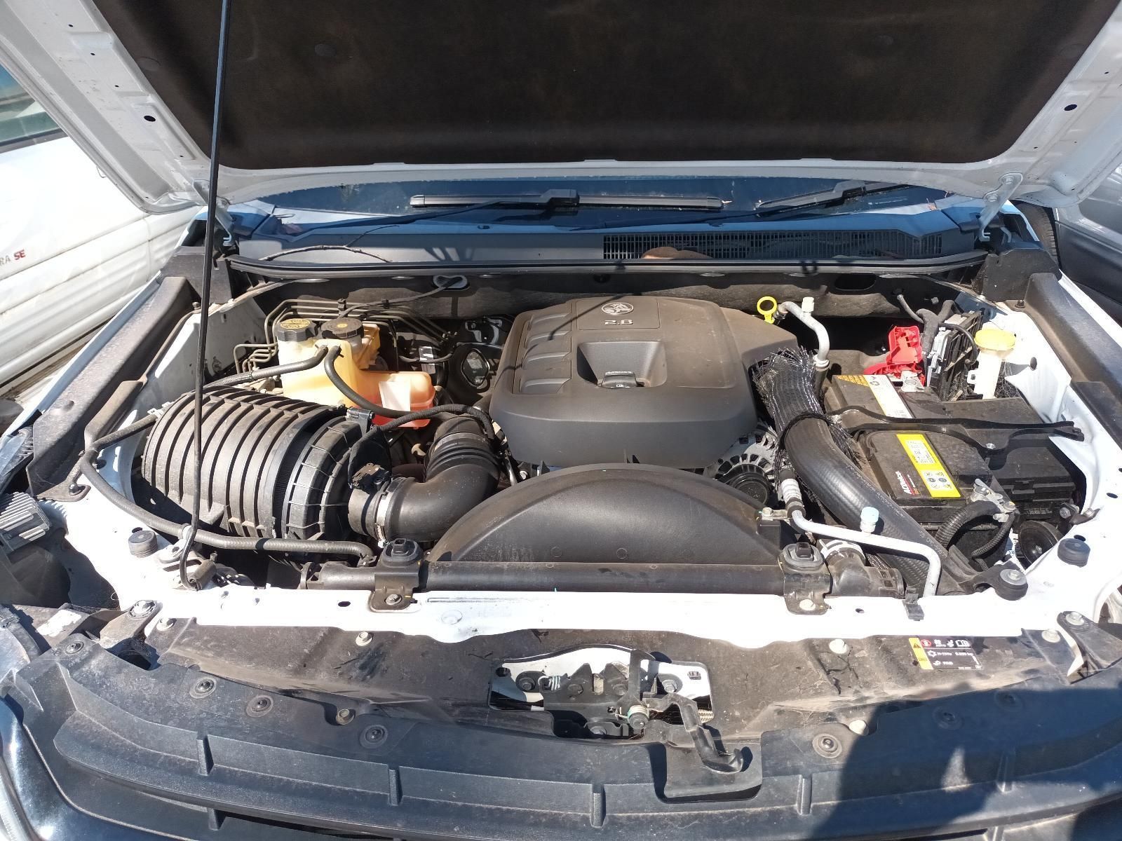 The Engine of a White Car is Shown with the Hood Open — South West 4WD Wreckers in Harristown, QLD