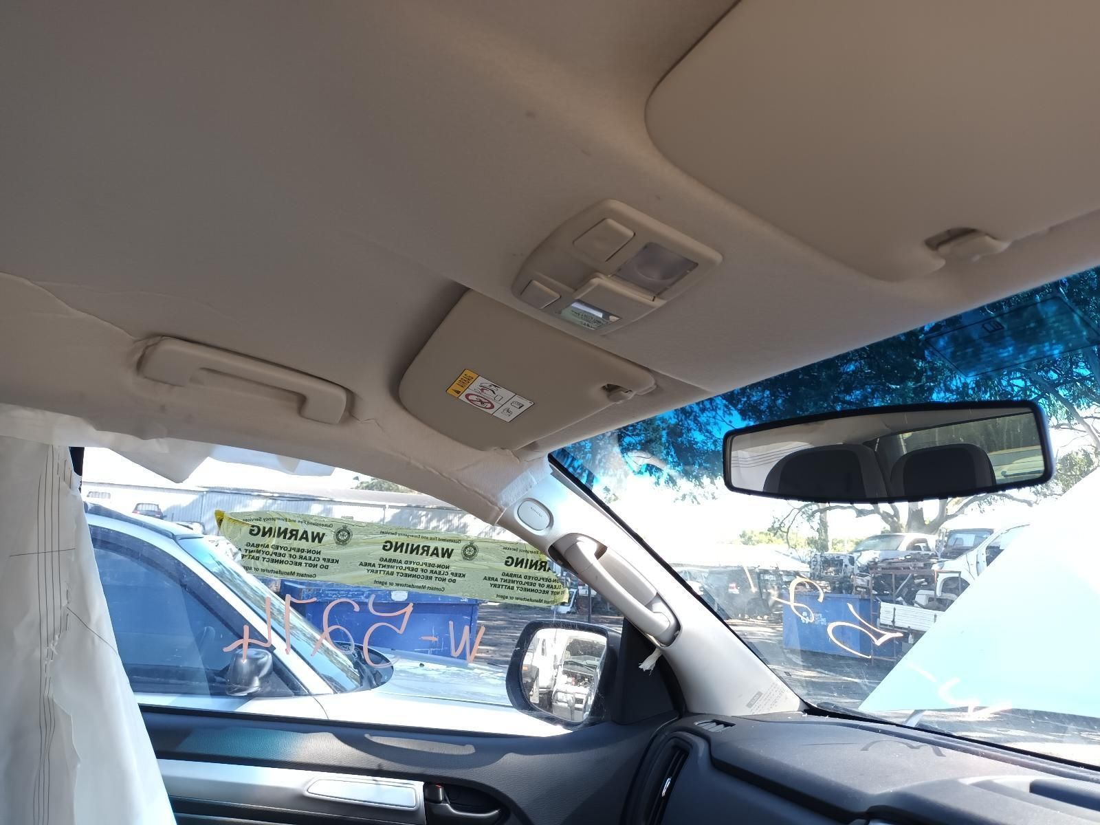 The Inside of a Car with a Ceiling Light and a Rear View Mirror — South West 4WD Wreckers in Harristown, QLD