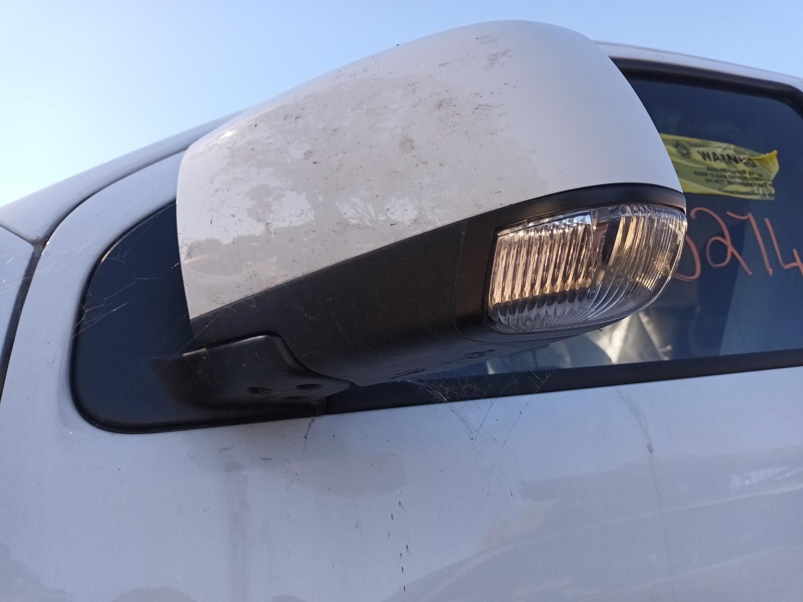 A Close Up of a Side View Mirror on a White Truck — South West 4WD Wreckers in Harristown, QLD