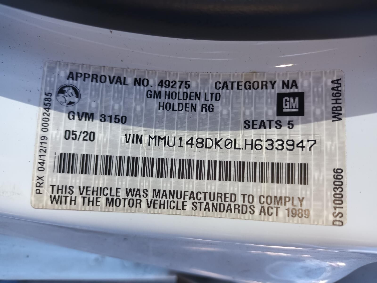 A White Car with a Sticker on the Side — South West 4WD Wreckers in Harristown, QLD